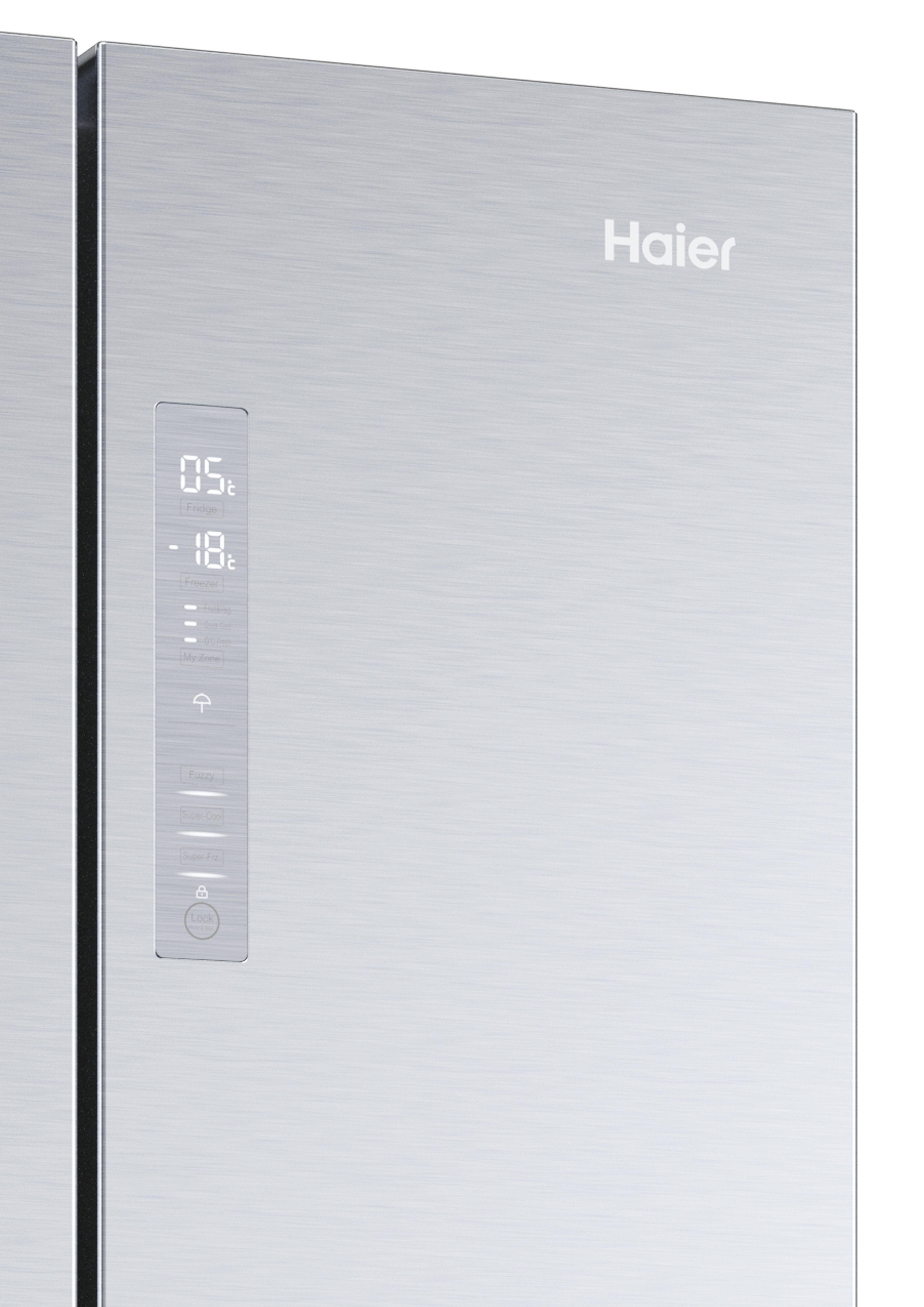 Edelstahl-Kühlschranktür mit Digitalanzeige und dem Haier-Logo.