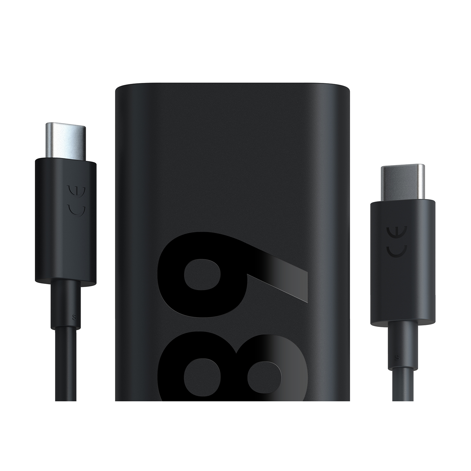 Adattatore di alimentazione nero con due cavi USB-C. L'adattatore ha il numero 69 stampato.