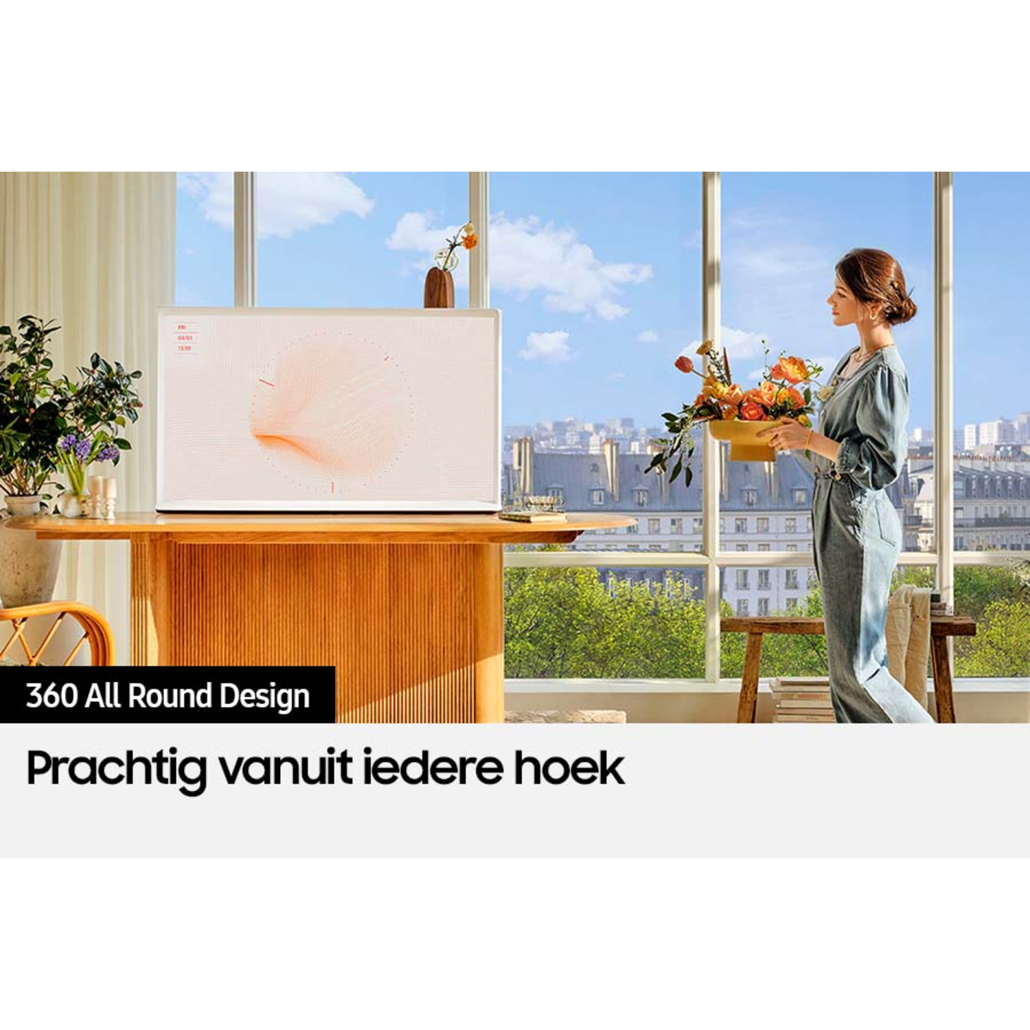 A woman holds a flower arrangement. A TV is on a wooden table. A cityscape is visible through the window.