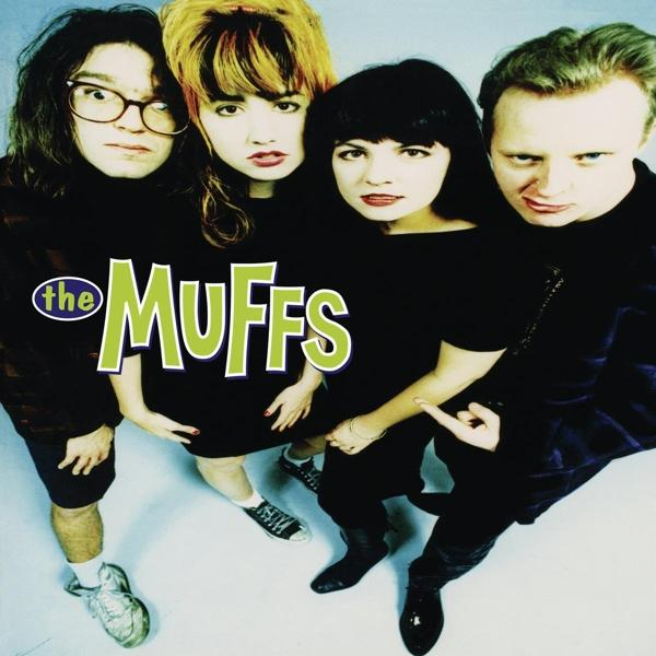 Ein Bandfoto von The Muffs, vier Personen schauen in die Kamera.