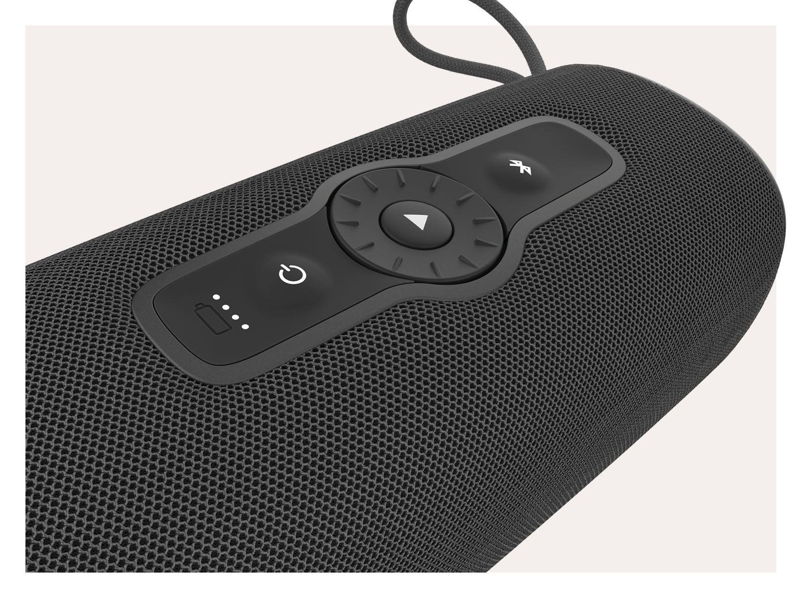 Close-up of a black speaker with control buttons. The speaker has a textured surface.