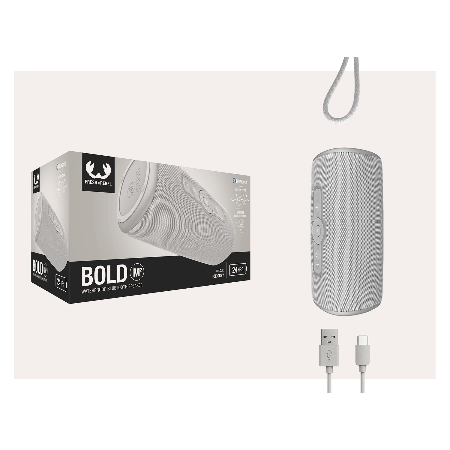 White and grey speaker, box, and USB cables on a white background. The speaker is cylindrical.