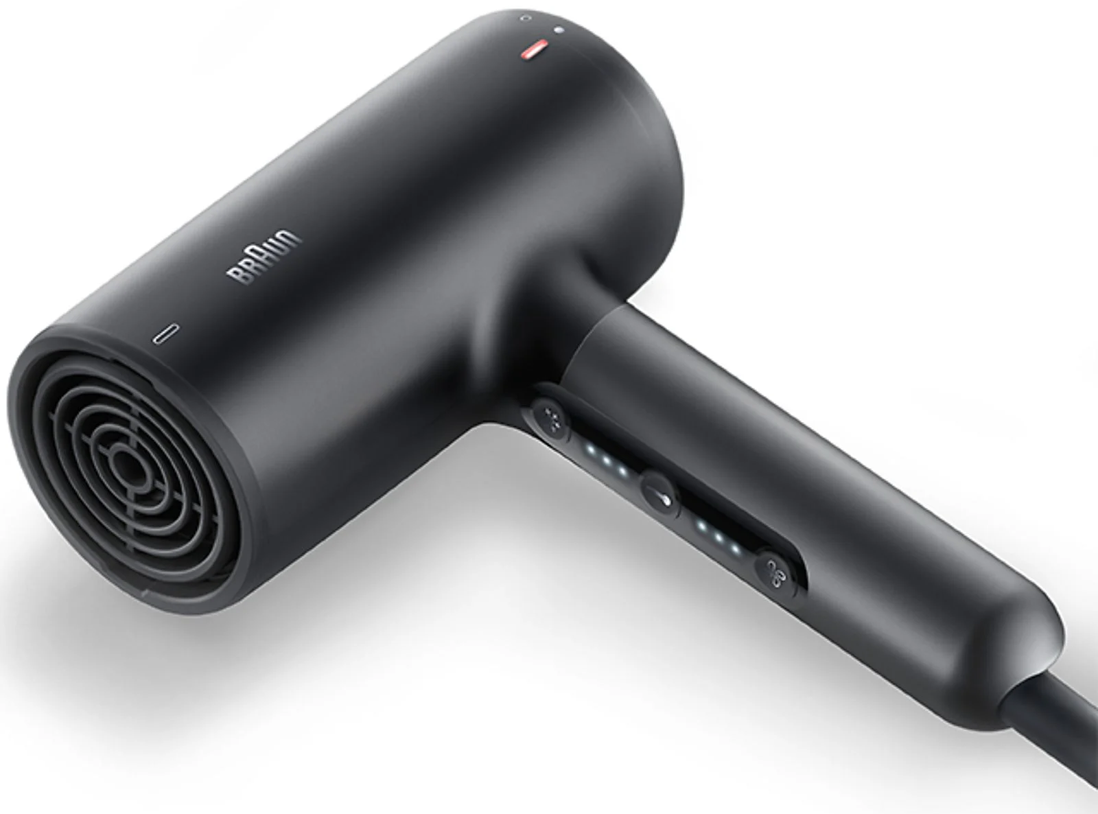 Sèche-cheveux Braun noir sur fond blanc. Il comporte des boutons et une grille avec un motif rotatif.