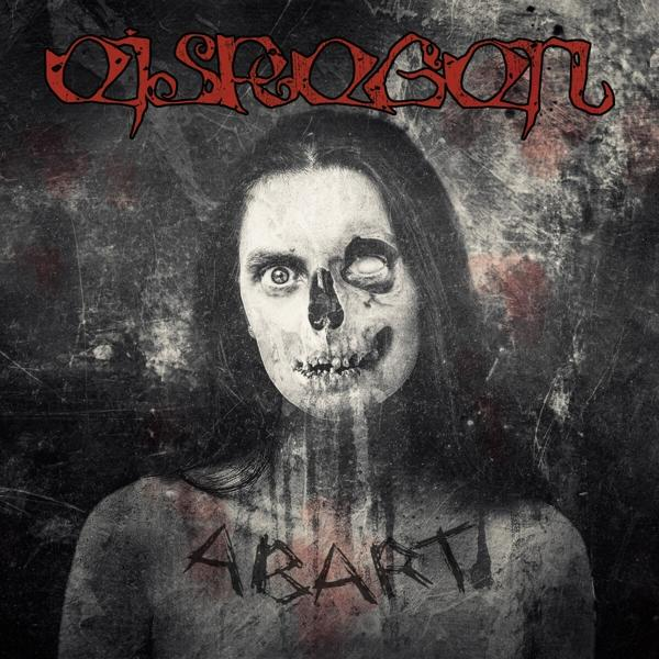 Albumcover mit Totenkopfgesicht, langen dunklen Haaren und dem Wort ABART in Rot.