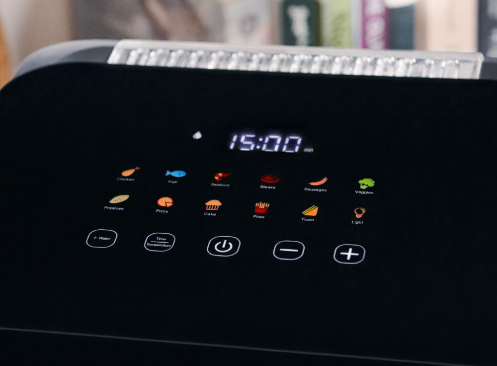 Czarny panel sterowania frytkownicy z wyświetlaczem cyfrowym i ikonami.