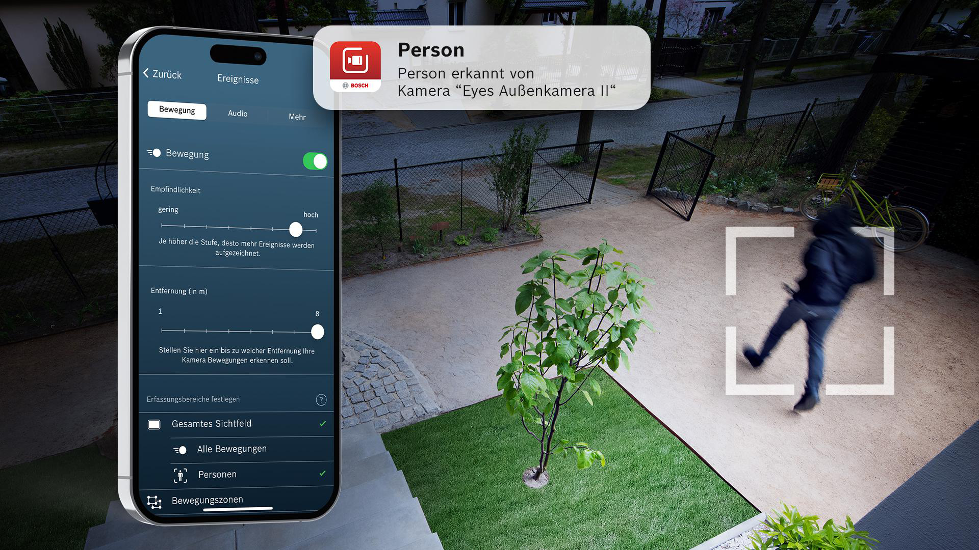 Eine Person wird auf einem Telefon erkannt. Im Hintergrund läuft ein Dieb, und das Telefon zeigt eine Benachrichtigung.