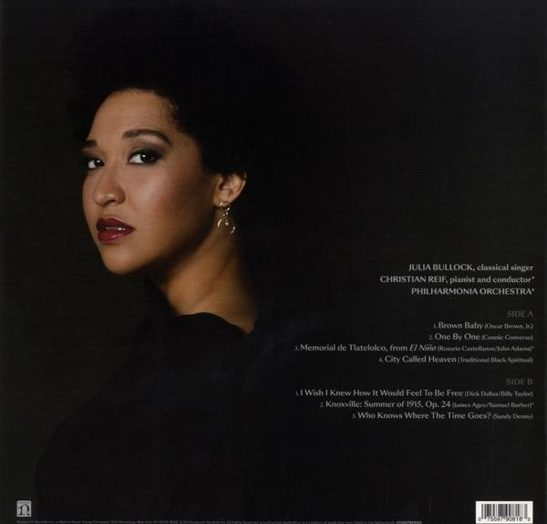 Albumcover einer Frau mit dunklem Haar und einem Text, der Songtitel und Credits auflistet.