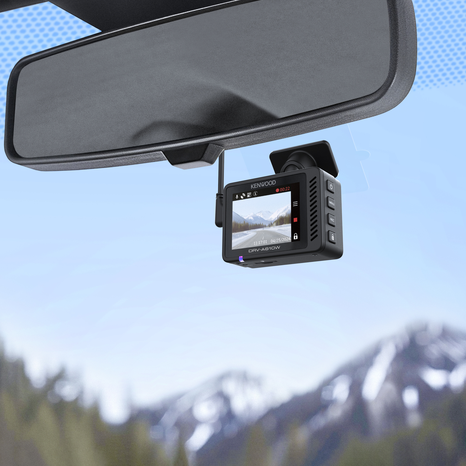 Dashboard camera mounted on windshield, with background view.