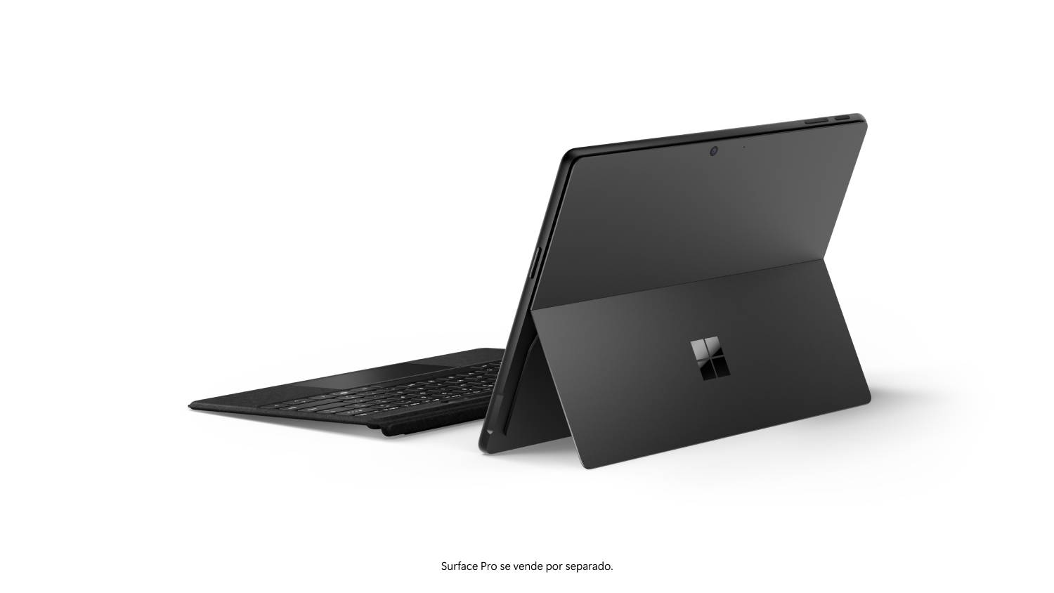 Tableta portátil negra con teclado. Soporte trasero abierto. Fondo blanco.