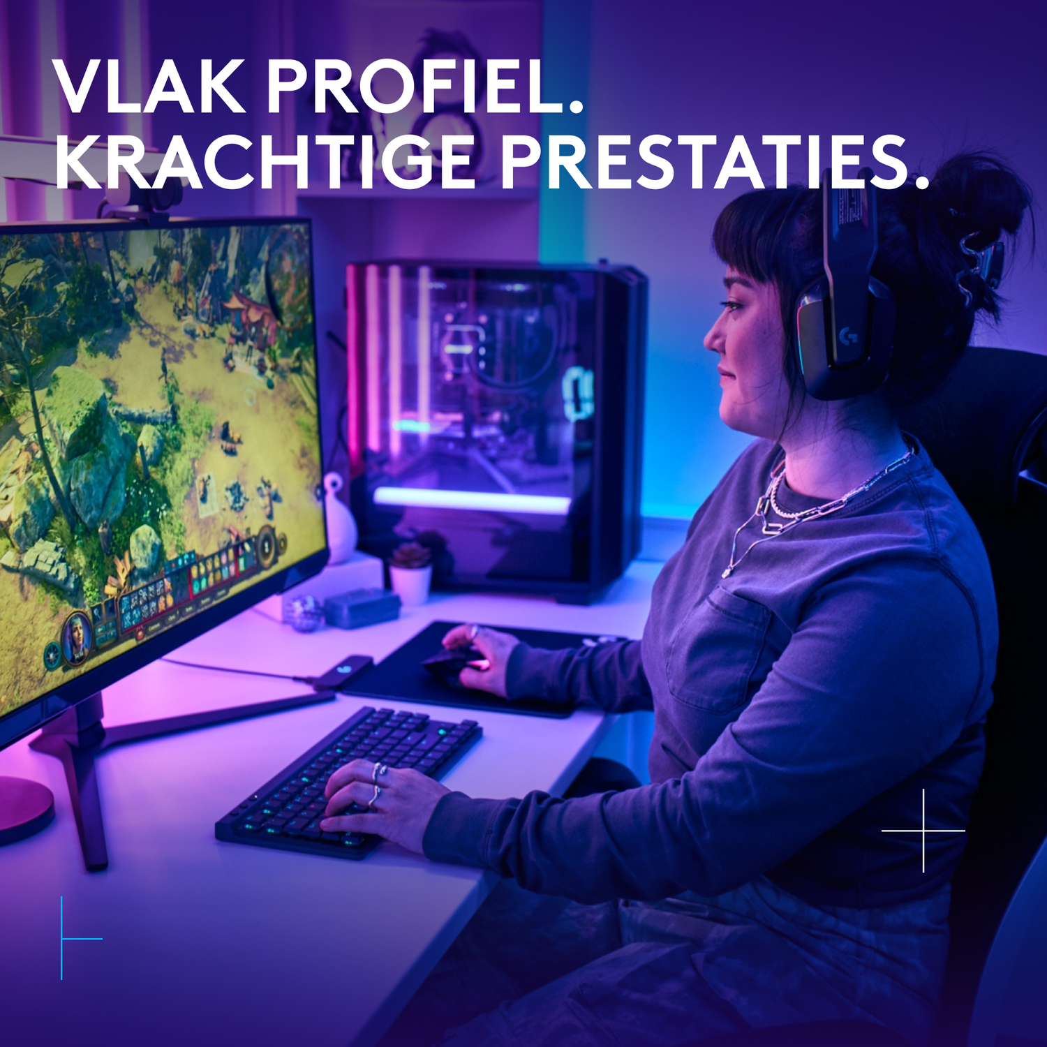 Woman gaming on a monitor, wearing headphones, with keyboard and computer in background.