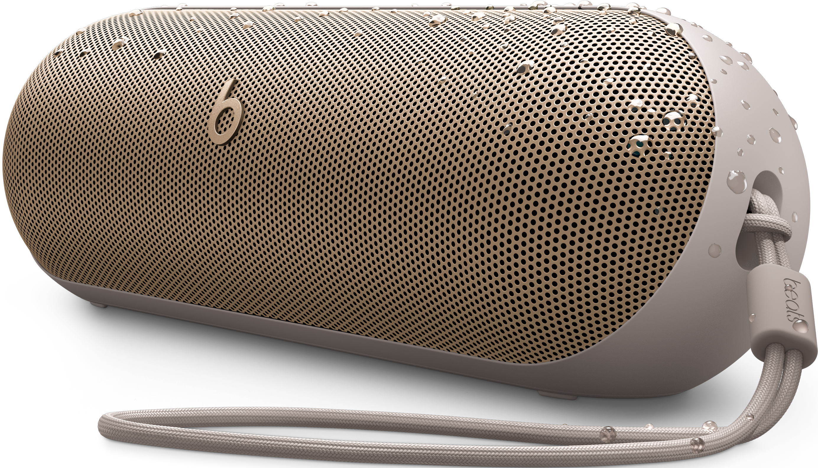 Enceinte Beats avec des gouttelettes d'eau. Palette de couleurs blanche et dorée.