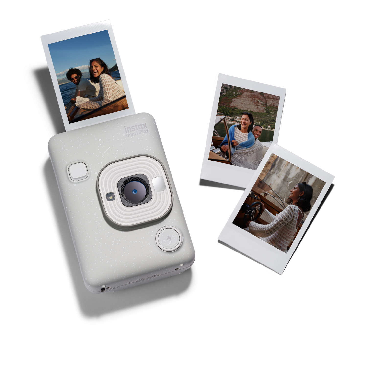 Instax Mini Liplay camera with photos being printed.