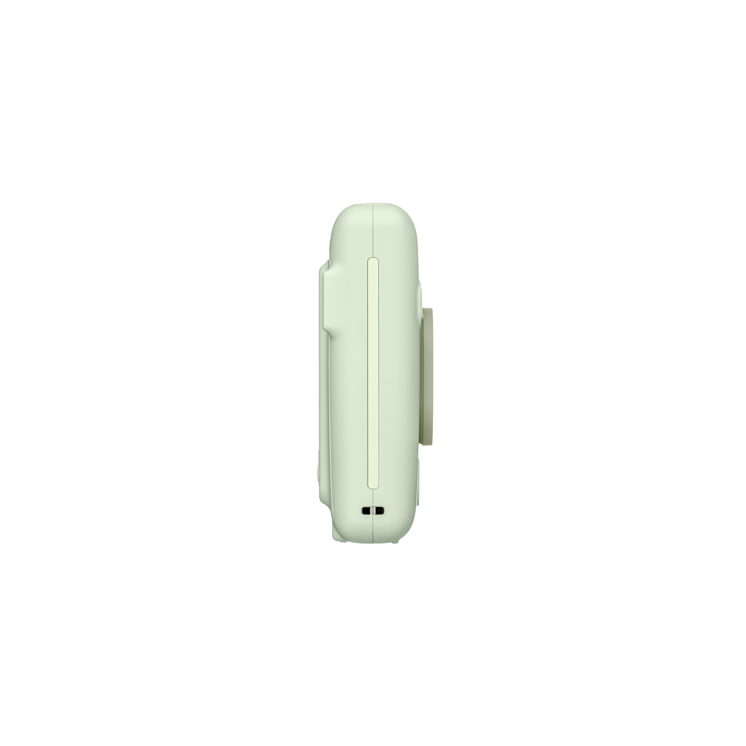 A light green, rectangular instant camera is seen from the side against a white background.