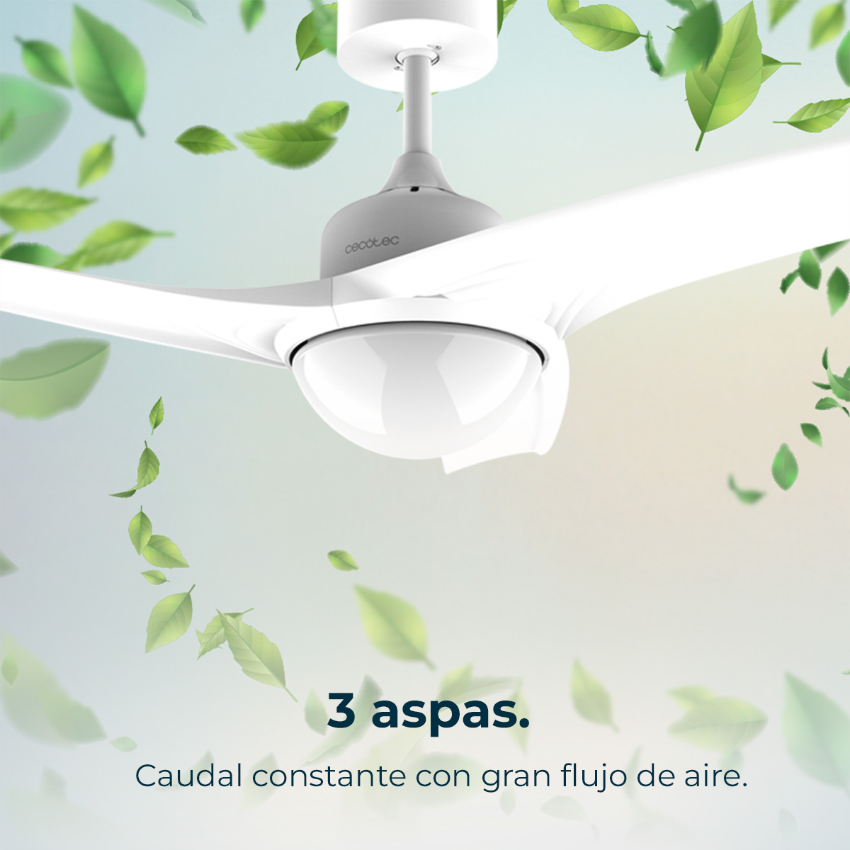 Ventilador de techo blanco con tres aspas y hojas verdes flotando a su alrededor.