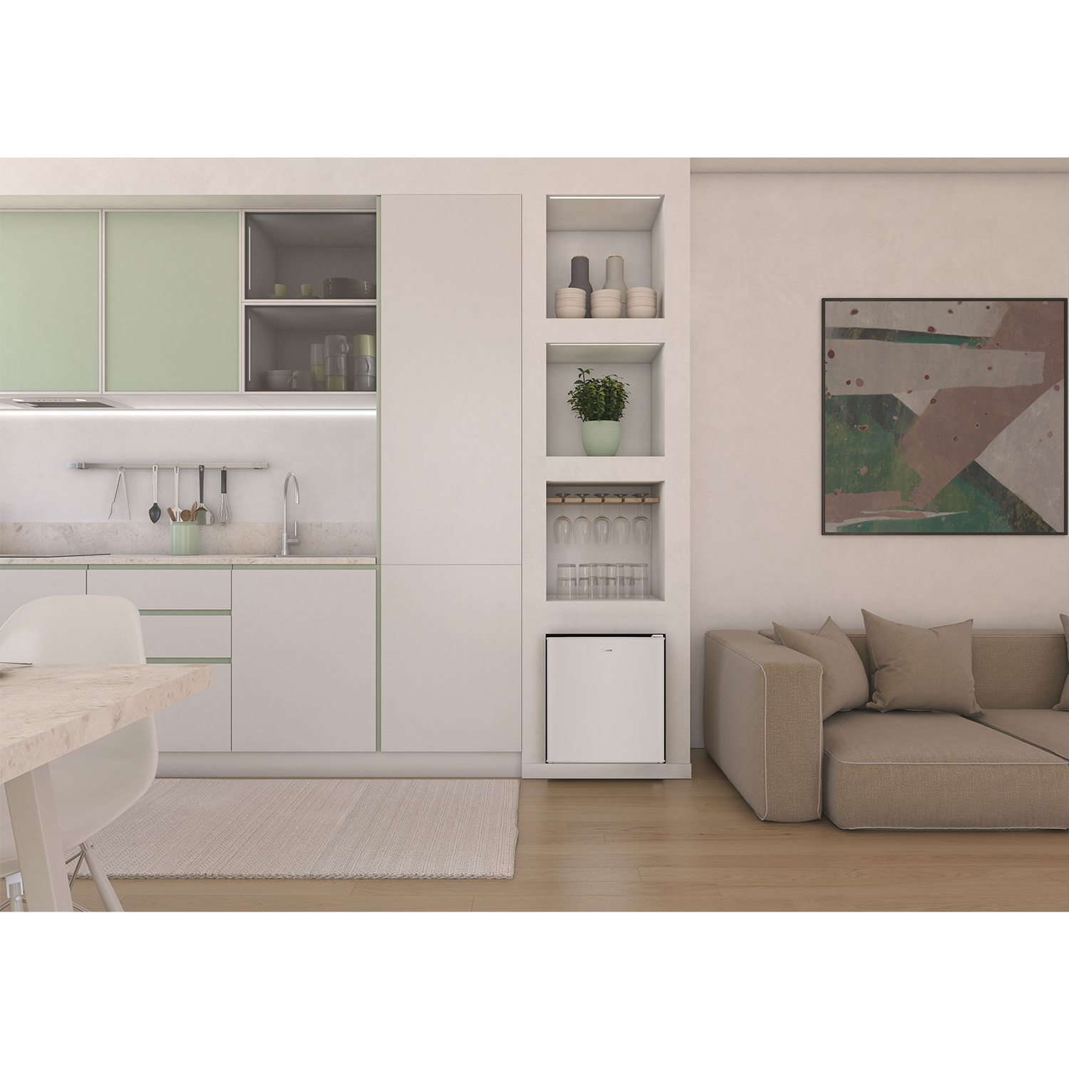 Cucina moderna. Mobili bianchi, finiture verdi, elettrodomestici e un divano beige.