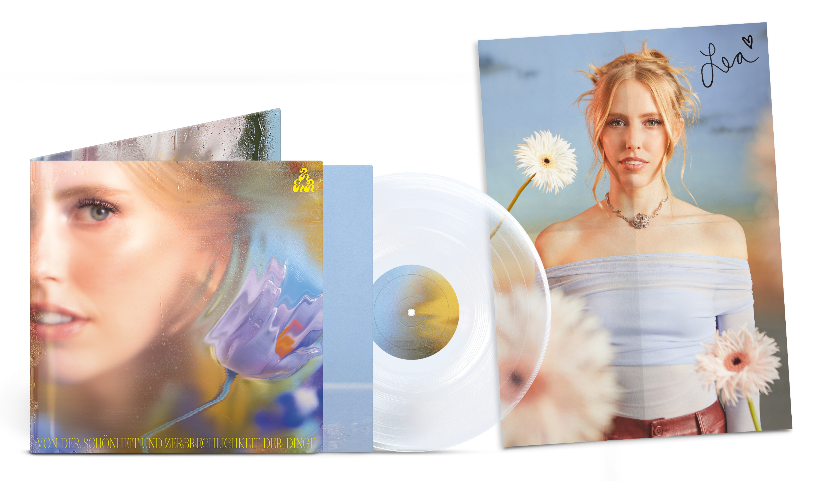 Albumcover und signiertes Foto einer Frau mit blonden Haaren, vor blauem Hintergrund mit Blumen.