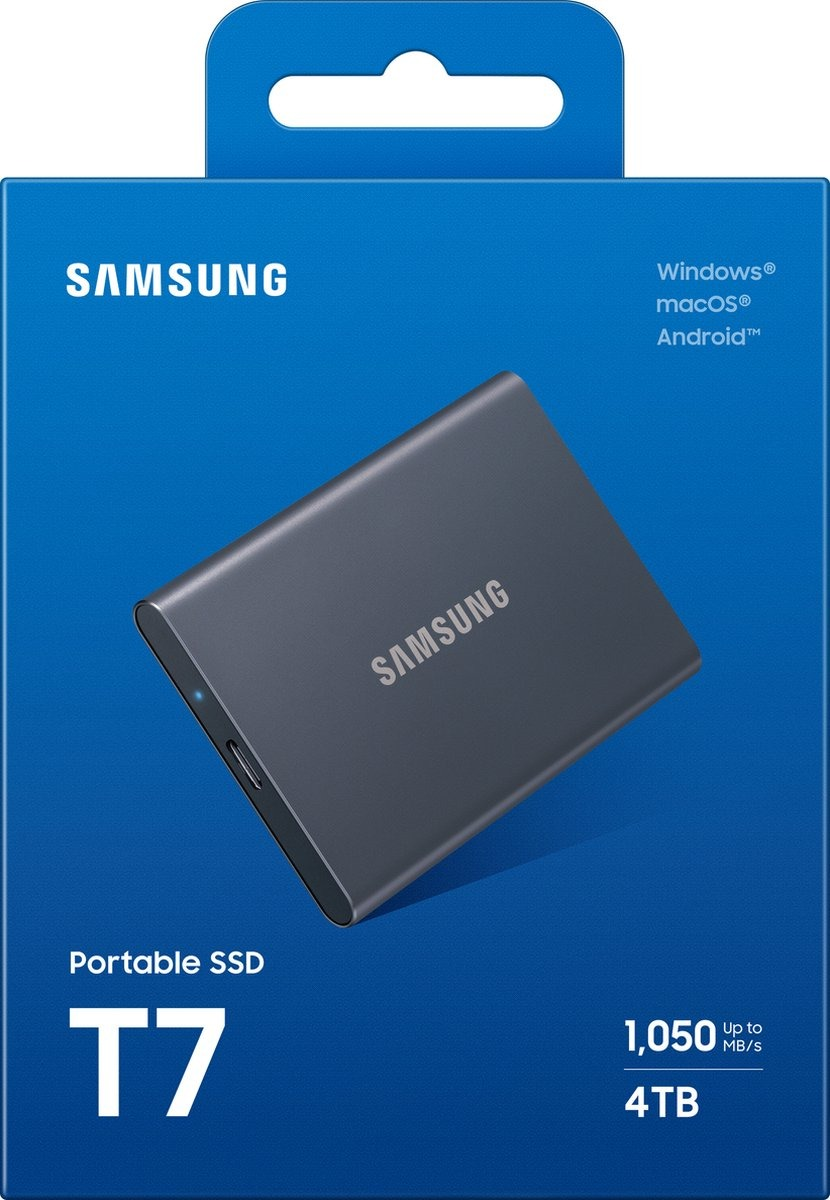 Samsung T7 portable SSD in a blue box. It is a dark gray color. The box says 4TB.