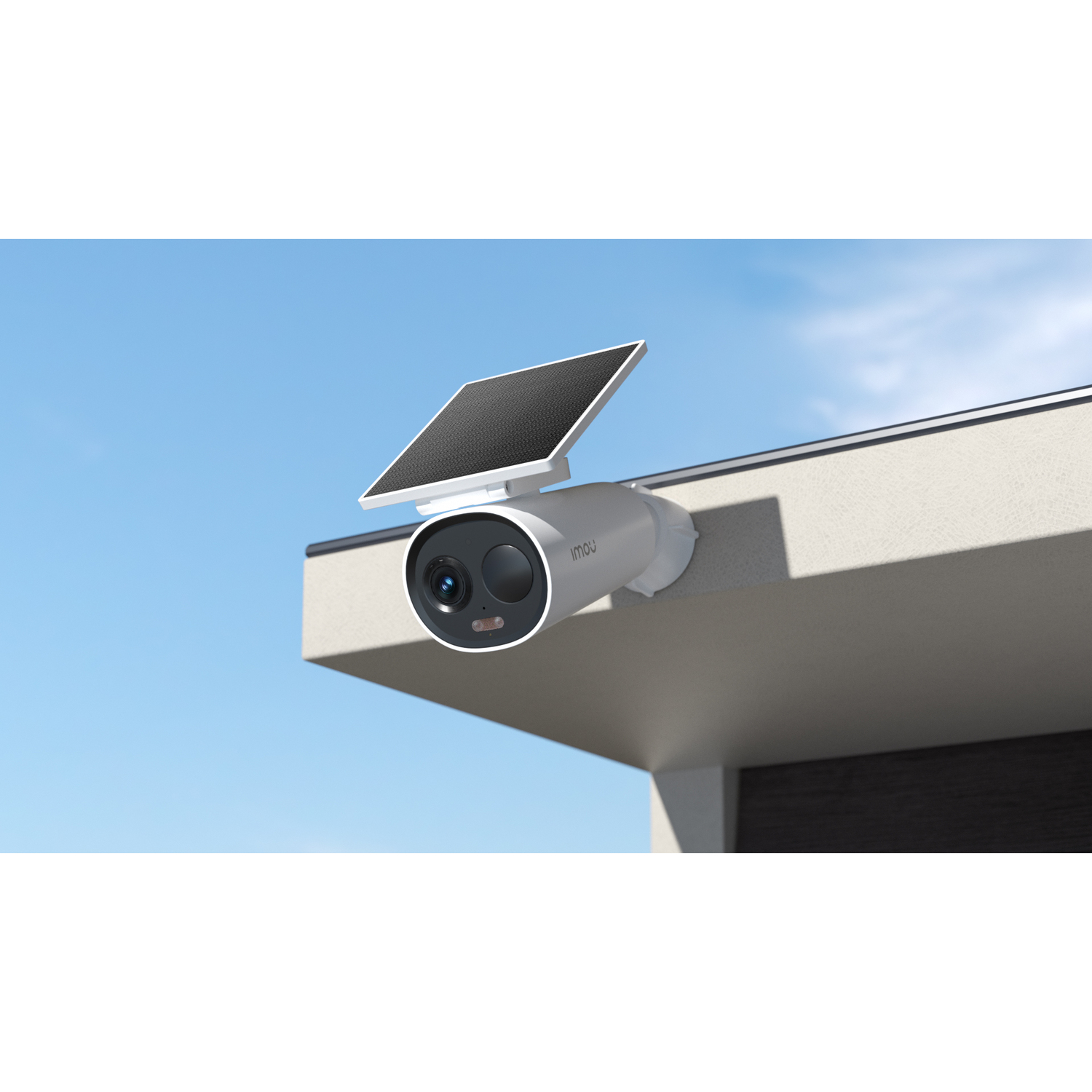 A white security camera mounted on a building with a solar panel on top.