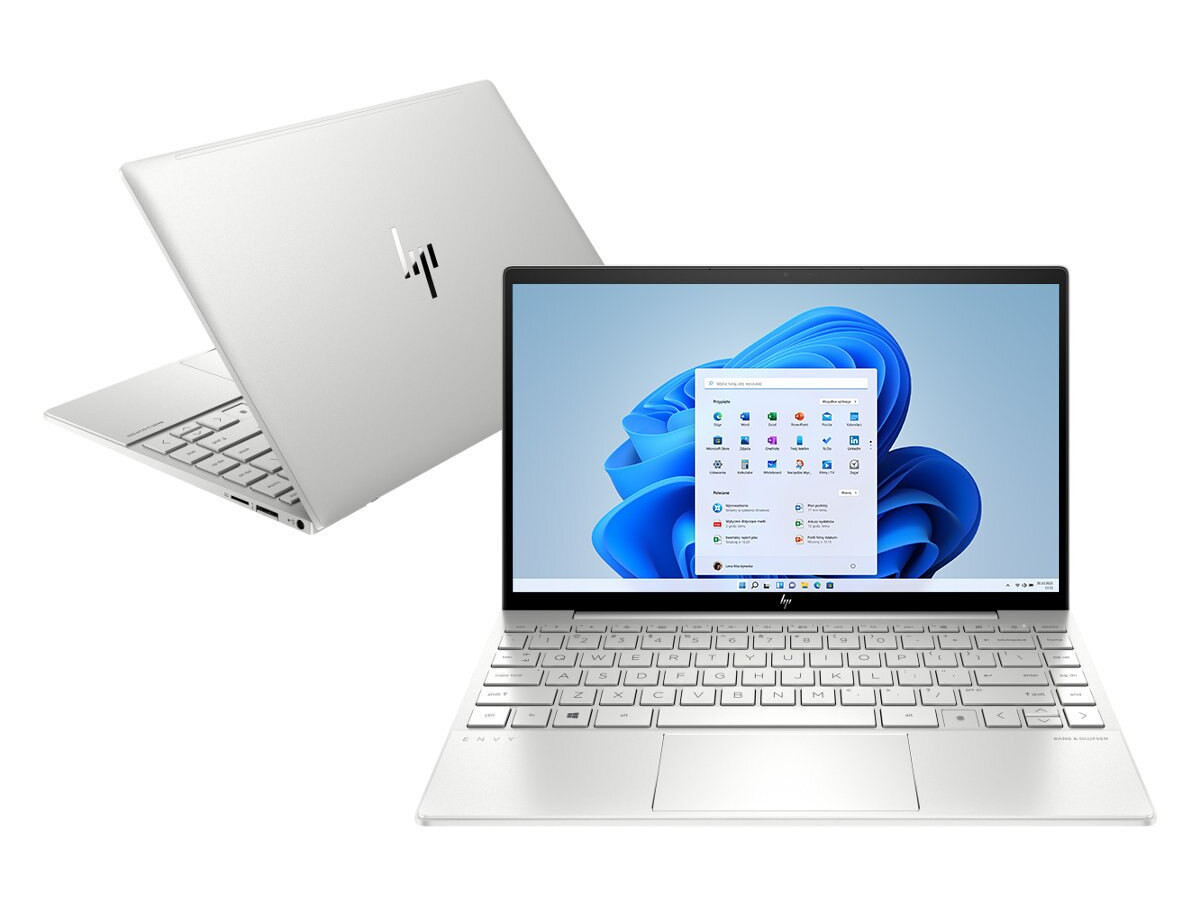 Dwa srebrne laptopy HP Envy. Jeden otwarty, z interfejsem Windows 11.