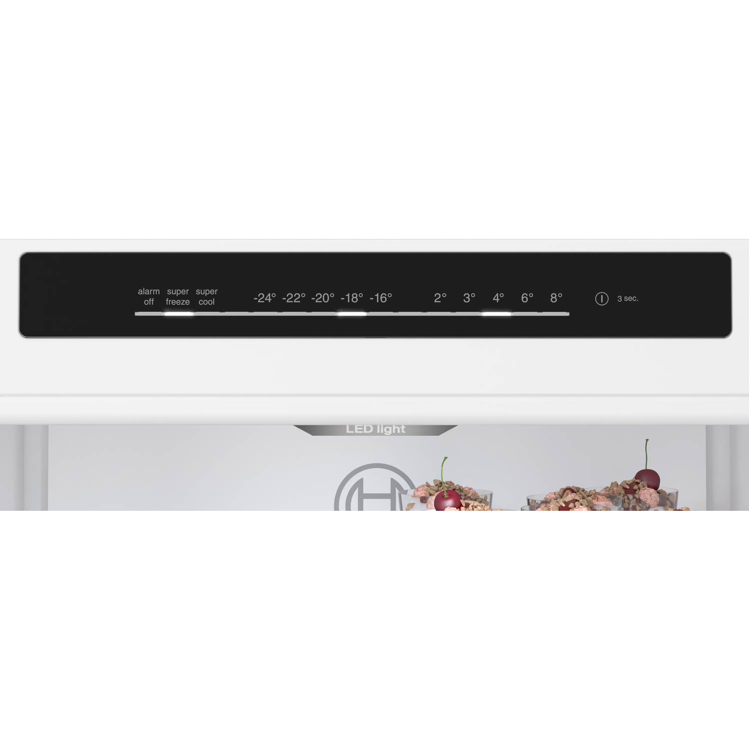 Close-up of a fridge control panel with temperature settings and LED light.