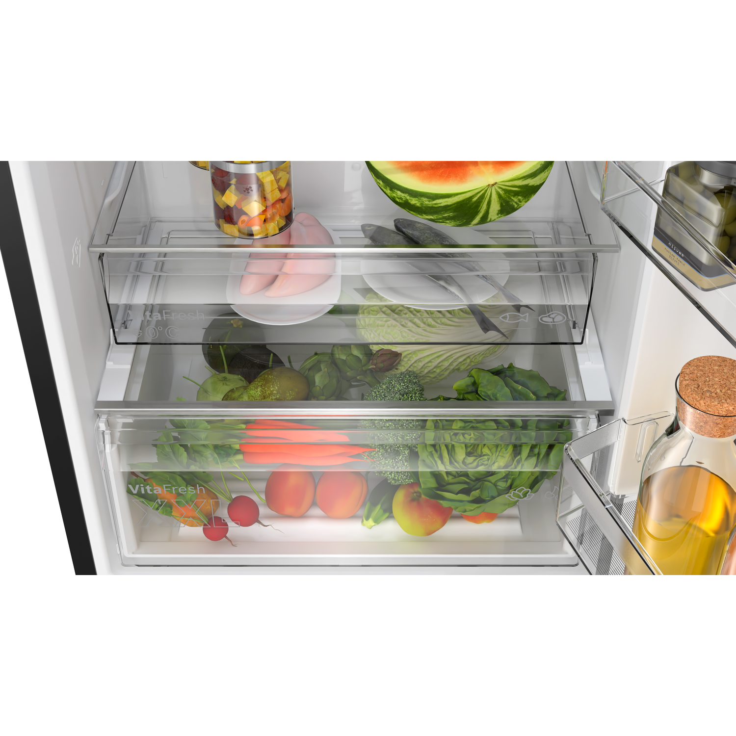Refrigerator drawers with fresh vegetables and fruits.