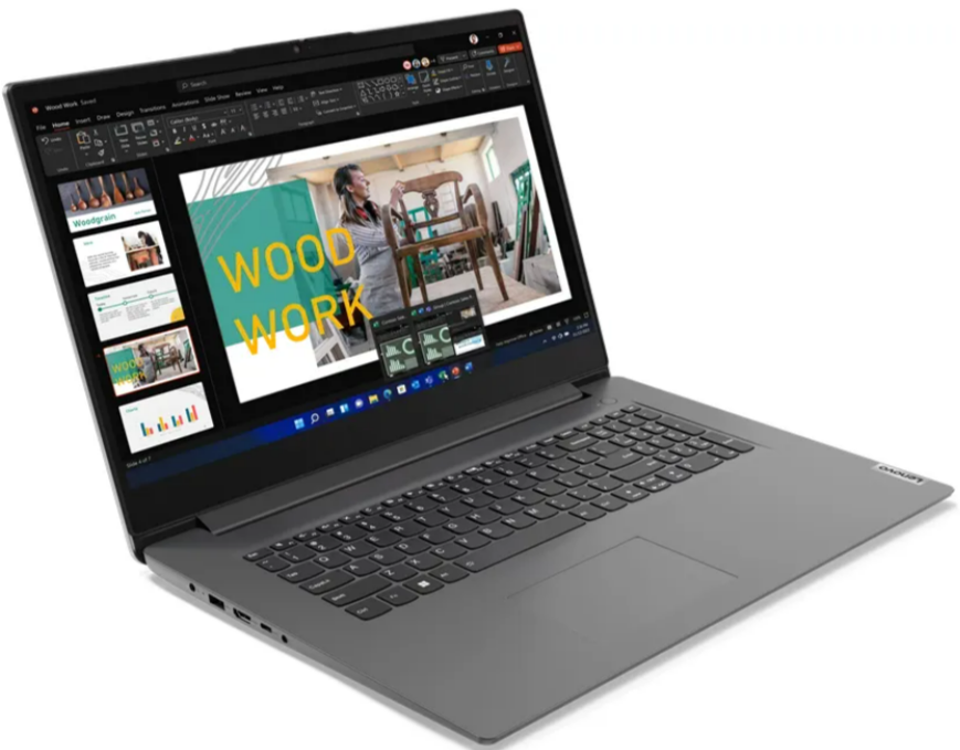 Ein grauer Laptop zeigt eine PowerPoint-Präsentation über Holzbearbeitung auf einer weißen Oberfläche.