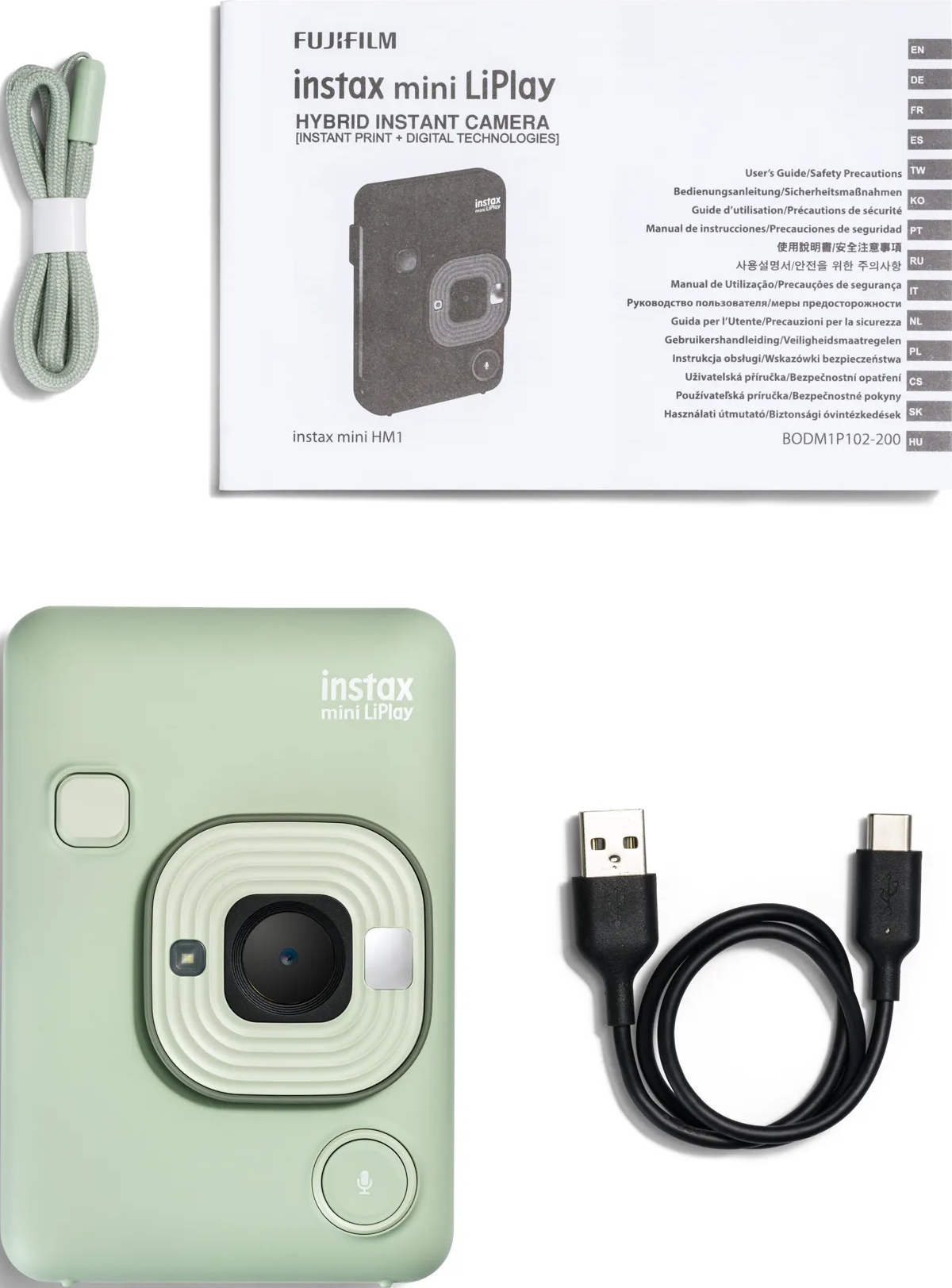 Un appareil photo Instax Mini LiPlay, vert menthe, avec accessoires: une sangle et un câble USB.