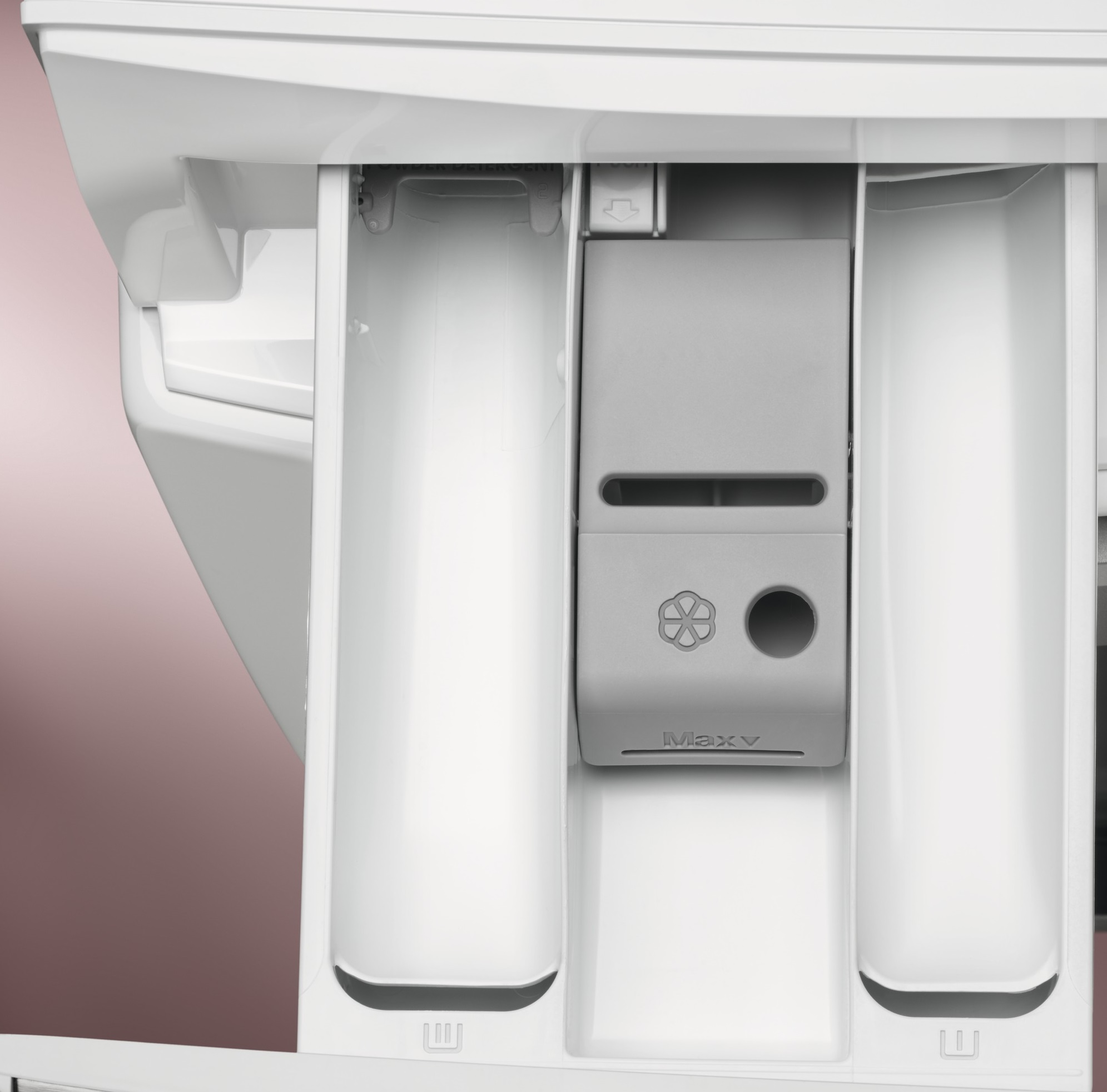 Szuflada na detergent pralki, pokazująca przegrody. Białe i szare kolory.