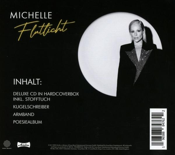 CD-Cover mit einer Frau in einem schwarzen Anzug und einem weißen Kreis-Hintergrund. Goldener Text.