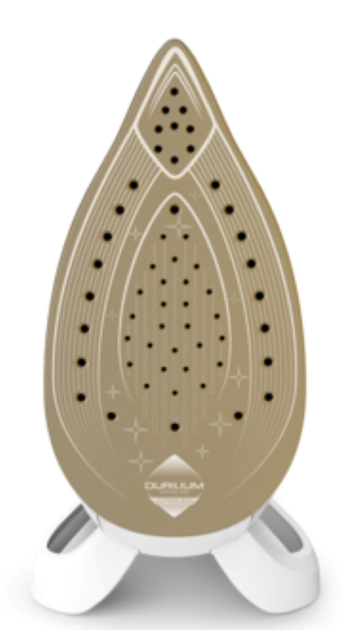 Płyta żelazka. Płyta jest beżowa z czarnymi kropkami i białymi podpórkami.