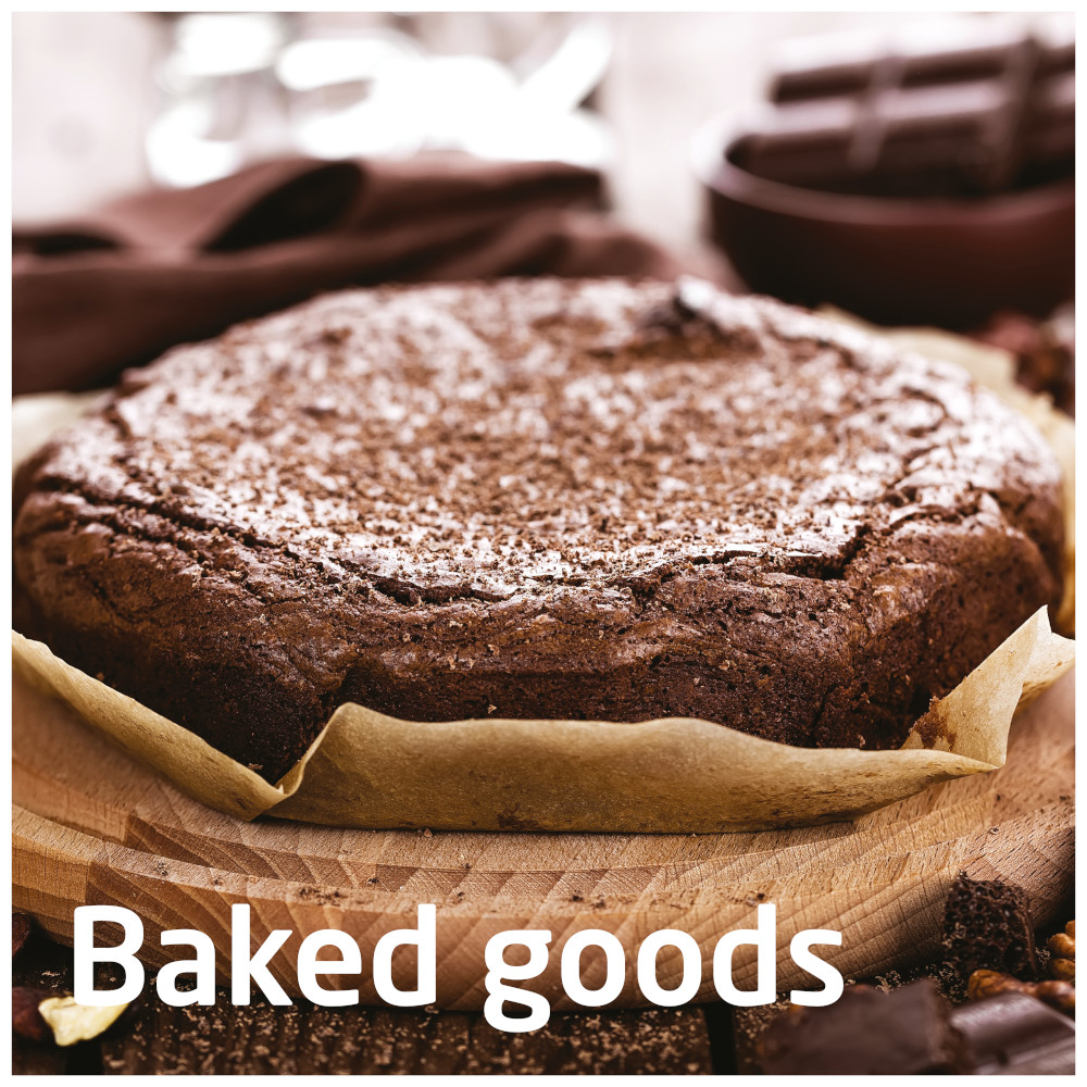 Baked goods: chocolate cake on a wooden board, with text.