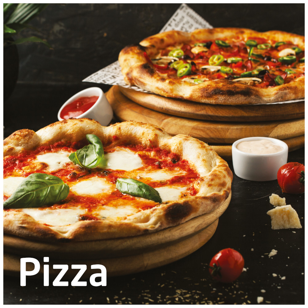 Two pizzas on wooden boards. One is Margherita, the other has toppings. Tomatoes and sauce on the side.