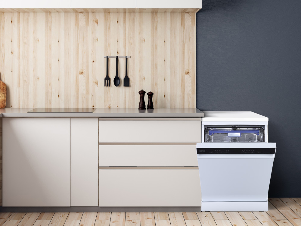 Kitchen with white cabinets, a dishwasher, a wooden wall, and a wooden floor.