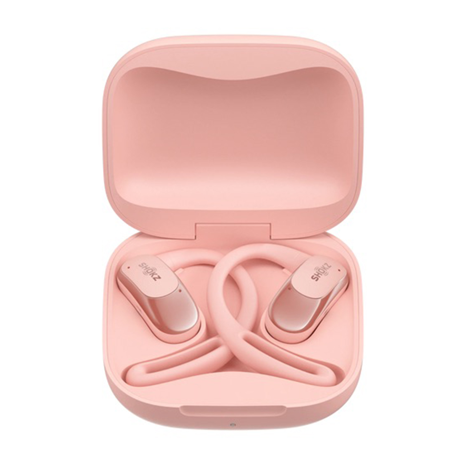 Cuffie Shokz rosa all'interno della loro custodia di ricarica rosa, aperta.