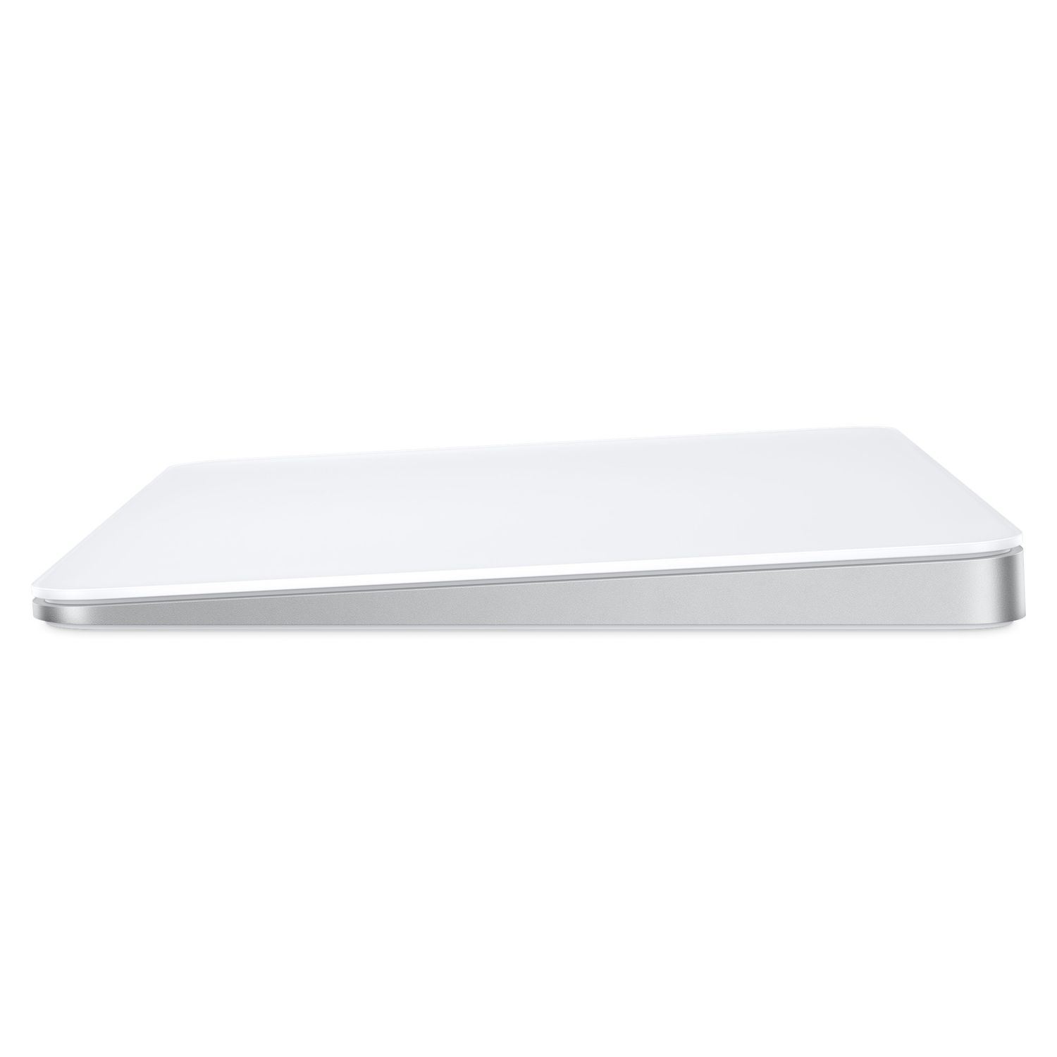 White Apple Magic Trackpad on a white surface. Angled view. Silver edge. White background.