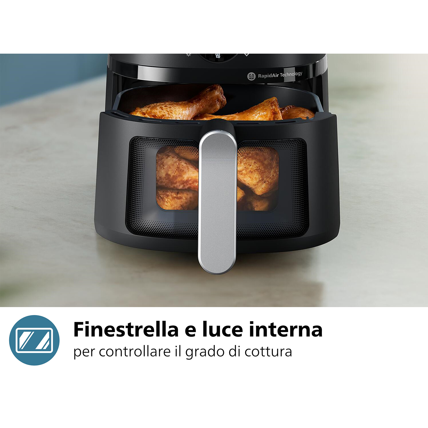 Friggitrice ad aria nera con una finestra di vetro che mostra pollo cotto.