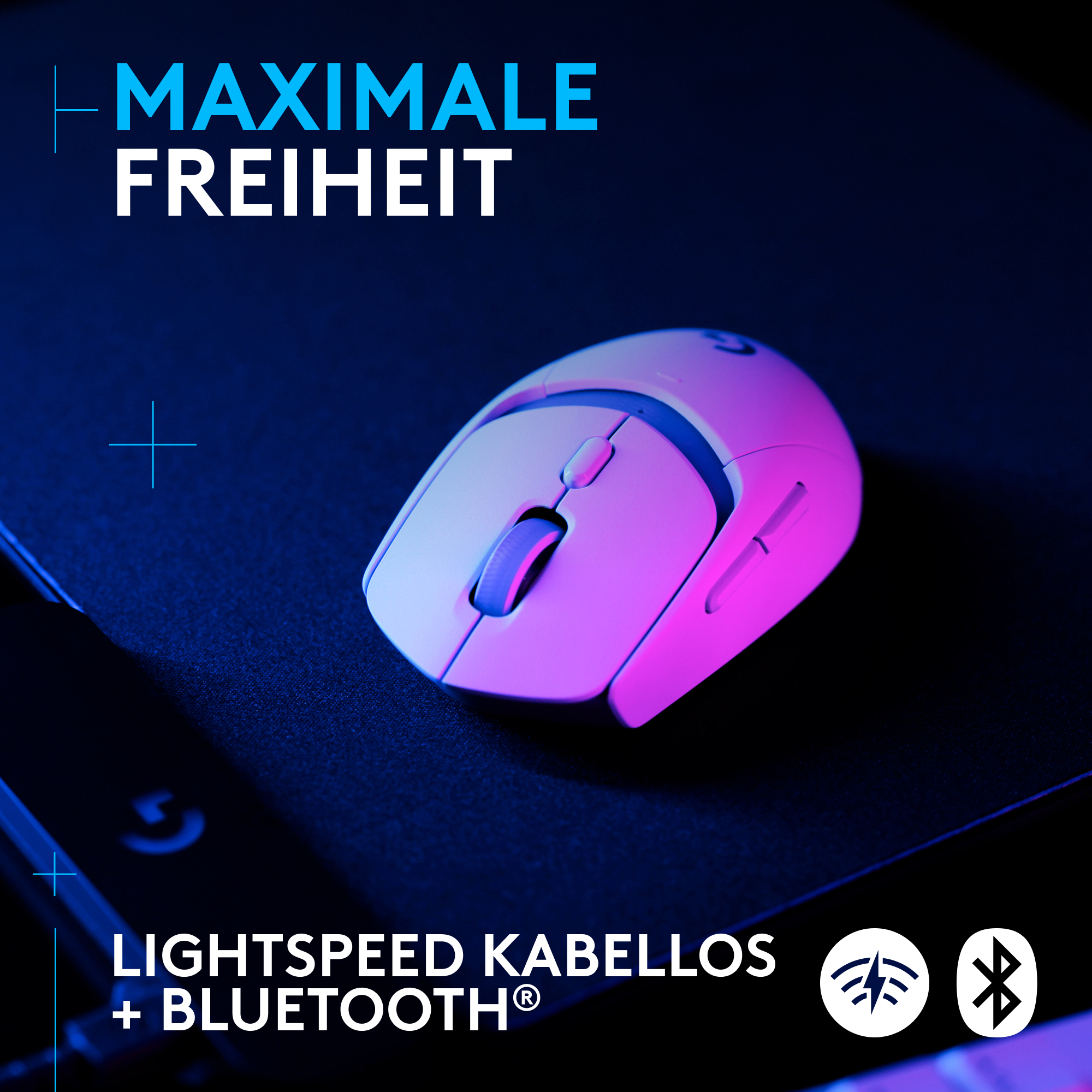 Weiße und pinke kabellose Maus auf dunkler Oberfläche. Text: 'MAXIMALE FREIHEIT'.