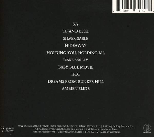 Pochette d'album avec fond noir et texte blanc listant les titres des chansons et les crédits.
