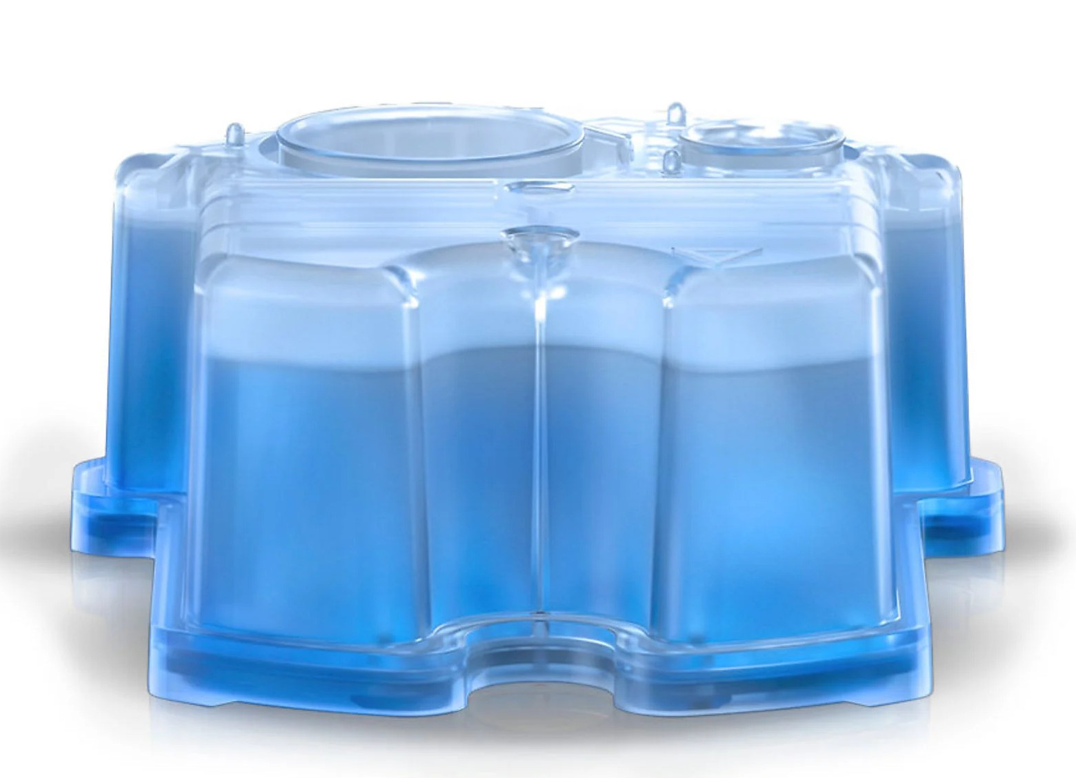 Przezroczysty niebieski plastikowy pojemnik o kwadratowej podstawie i zaokrąglonym wierzchu, wypełniony niebieskim płynem.
