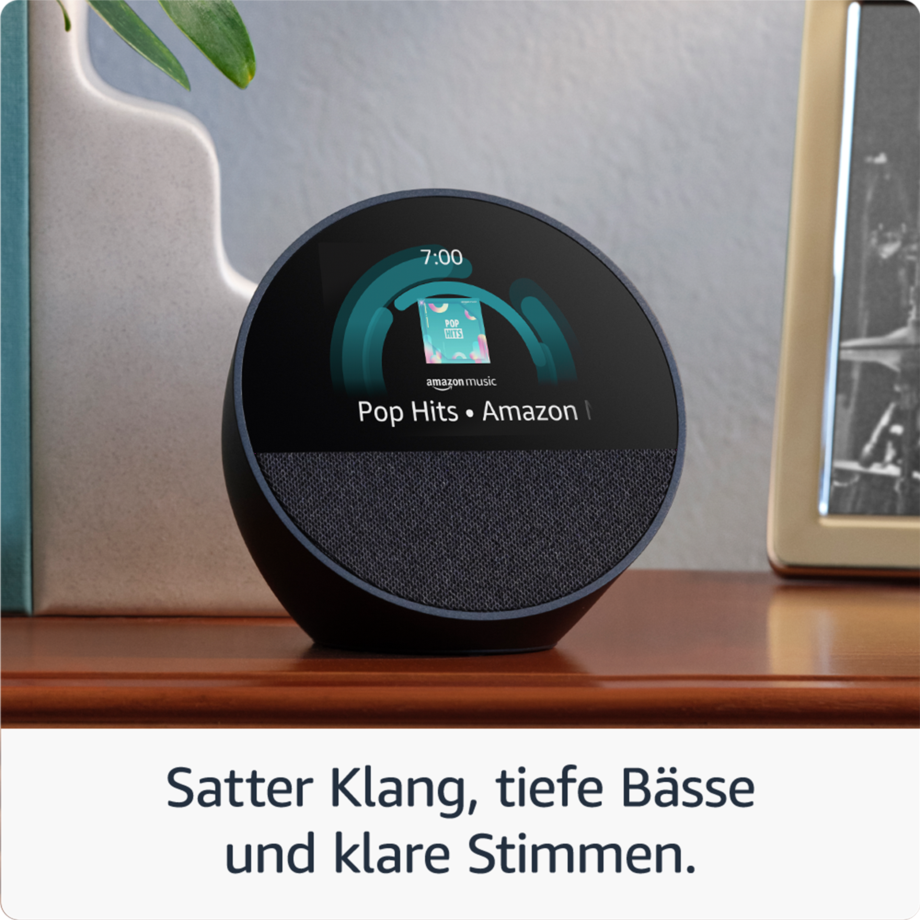 Ein Echo-Gerät auf Holz zeigt ein Weckersymbol.