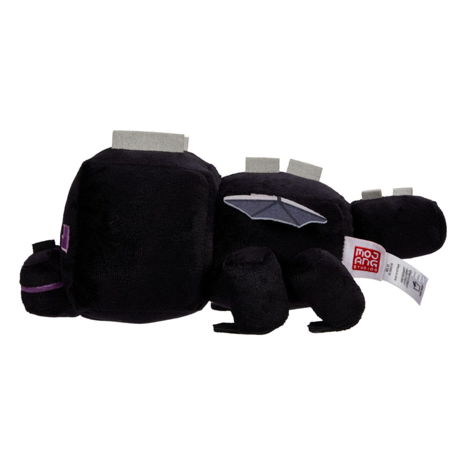 Black Ender Dragon plush toy with white tags, lying on a white surface.