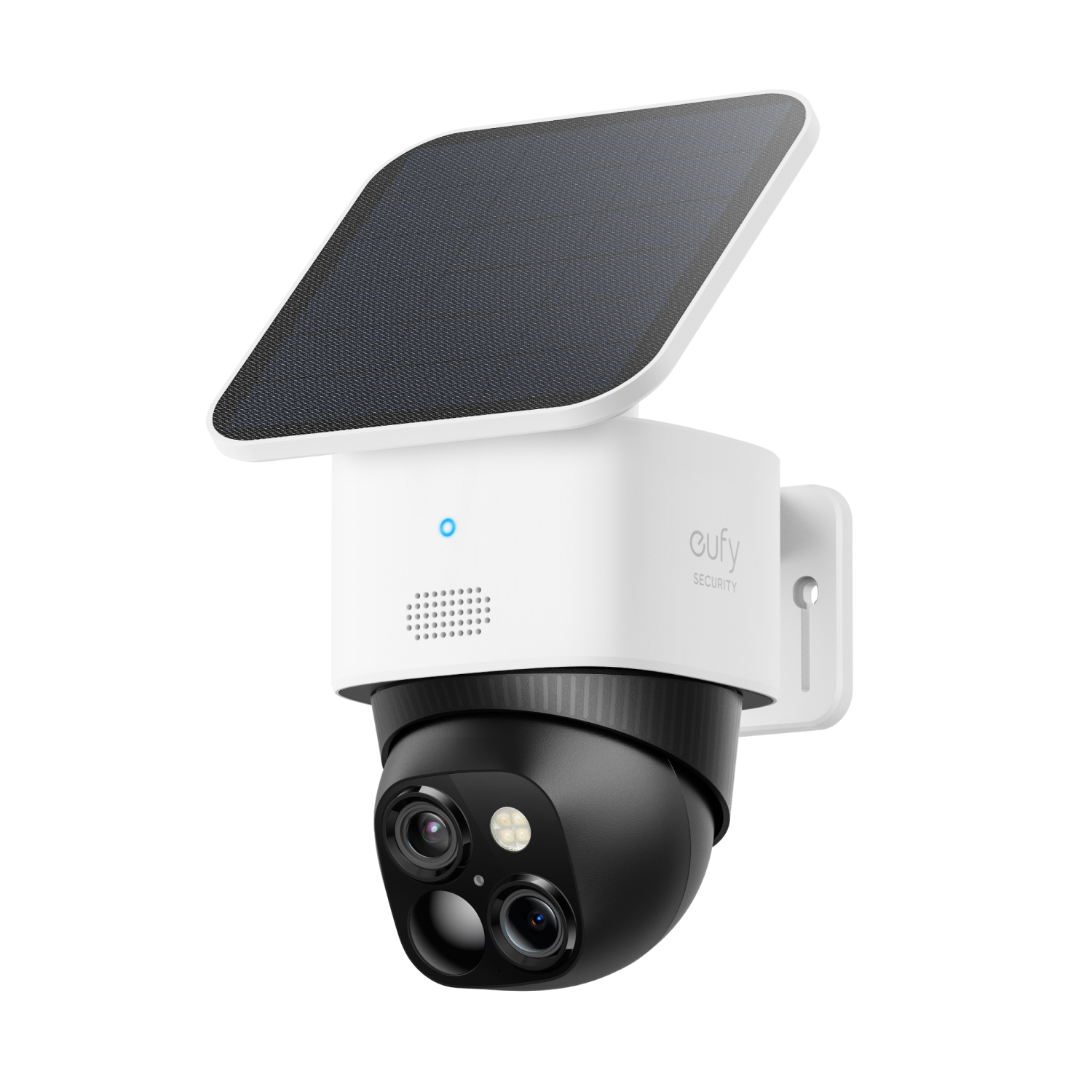 A security camera mounted on a white wall. The camera is black and has a solar panel above it.