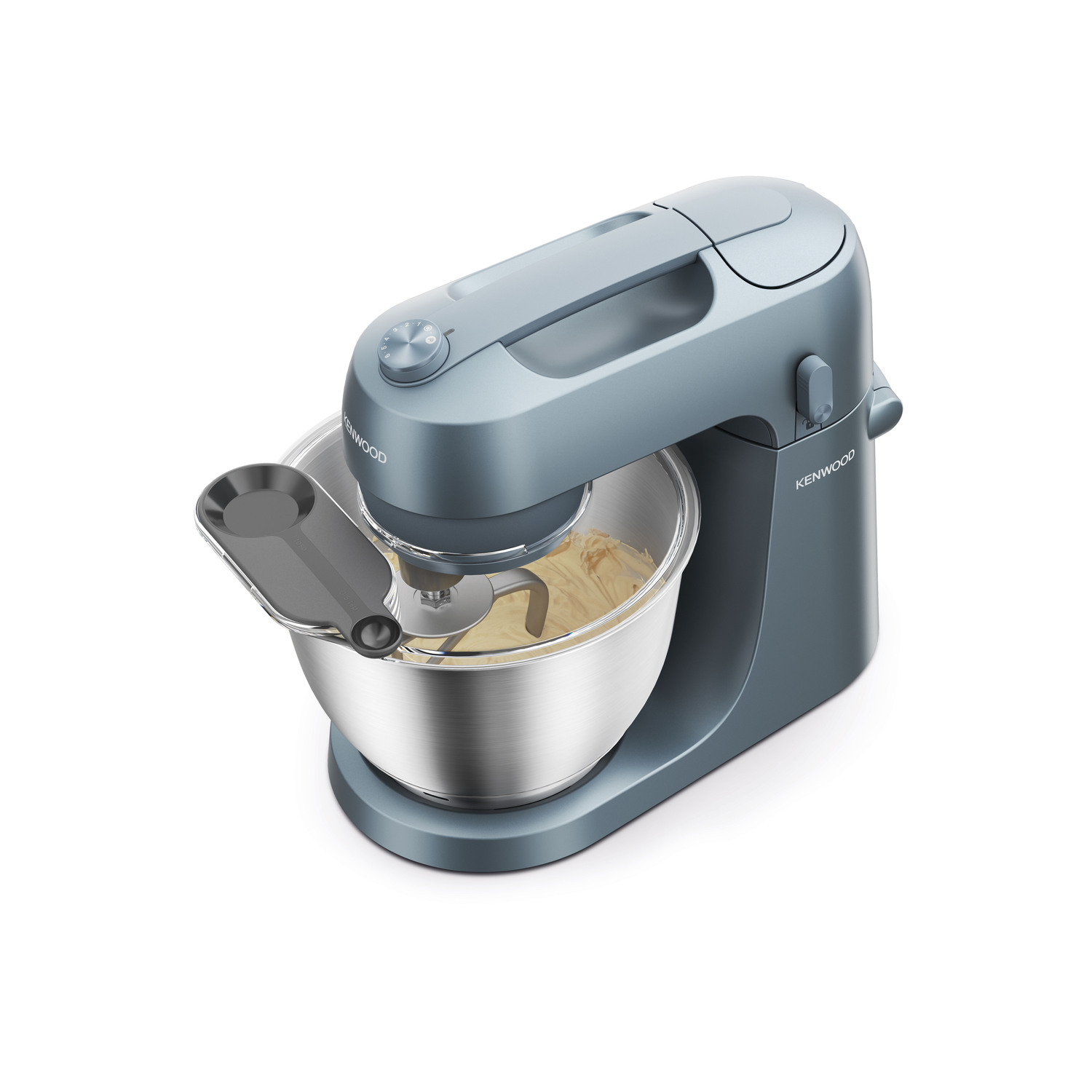 A gray stand mixer with a stainless steel bowl, and batter inside. Seen from an angle.