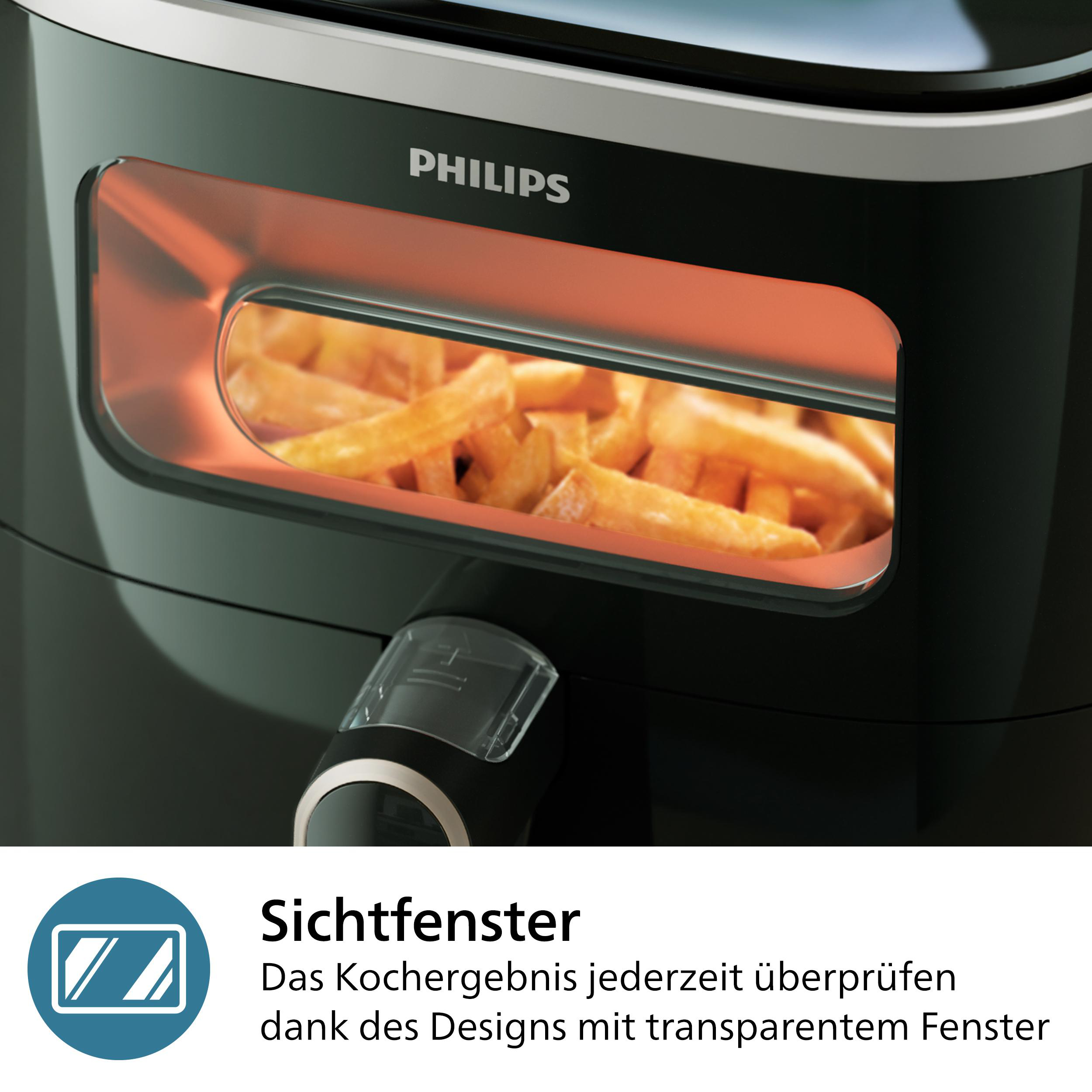 Schwarze Heißluftfritteuse mit Fenster und Pommes. Philips Logo sichtbar.