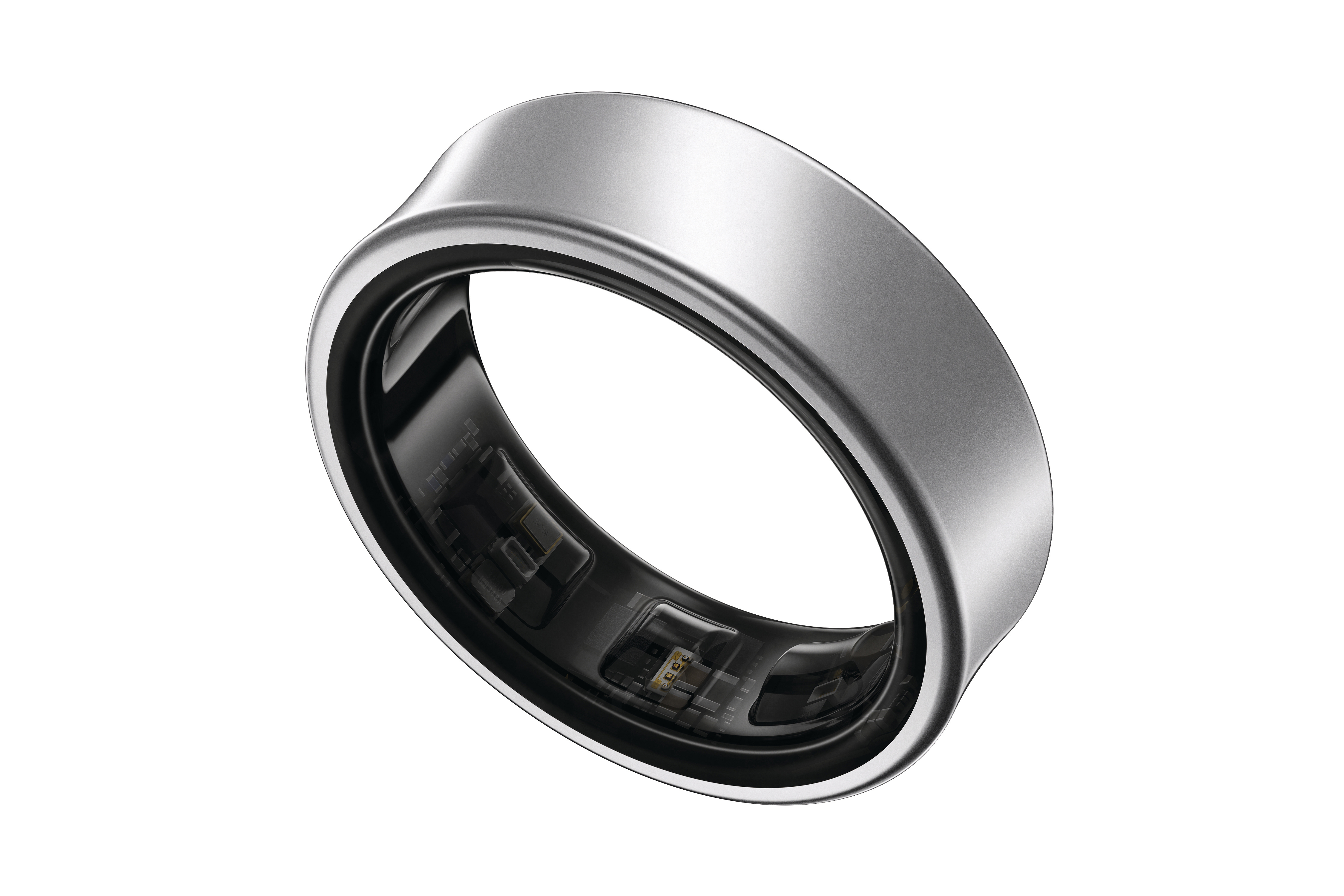 Ein silberner Ring mit dunklem Innenraum, der interne Komponenten zeigt.