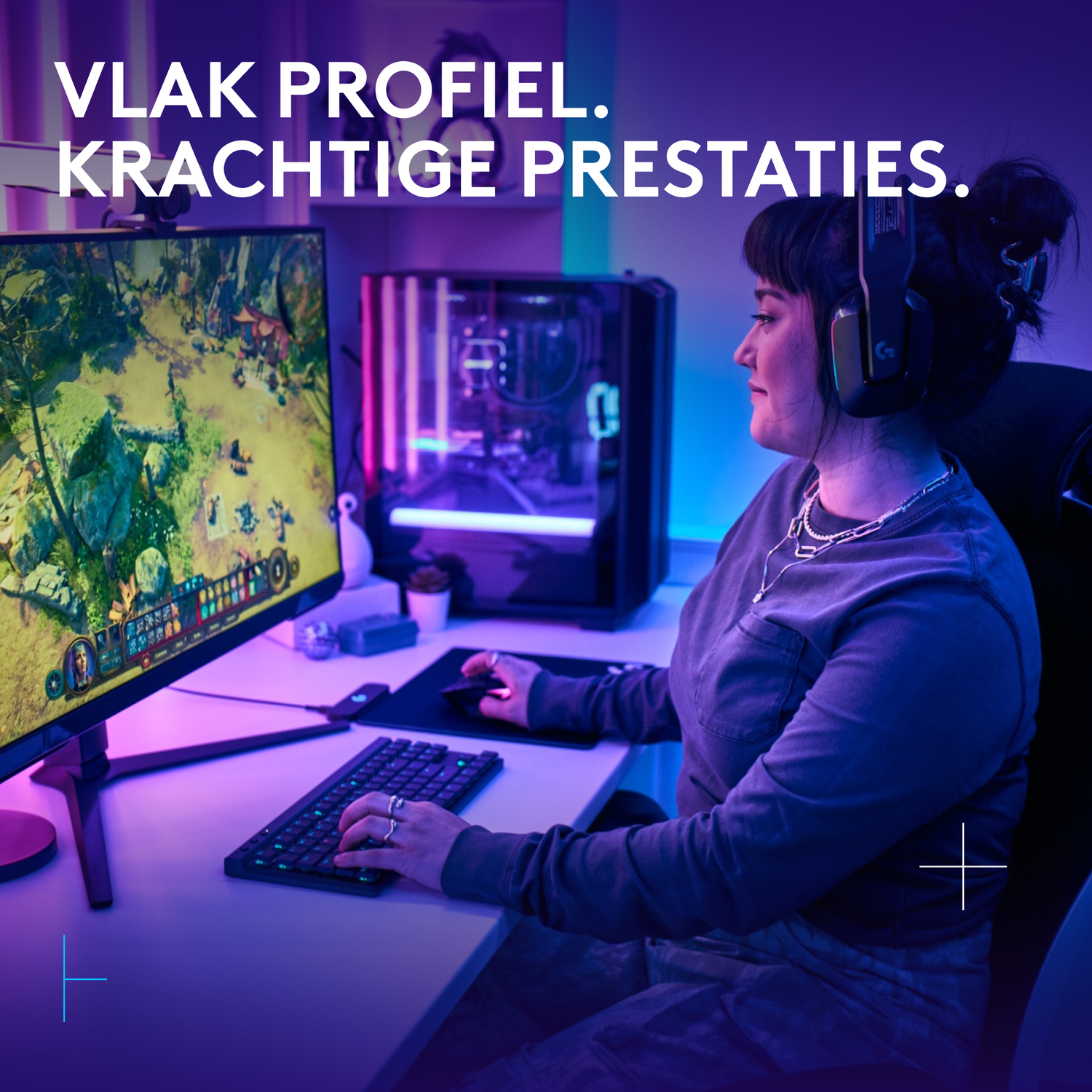 Person gaming on a computer with a monitor, keyboard, and mouse.