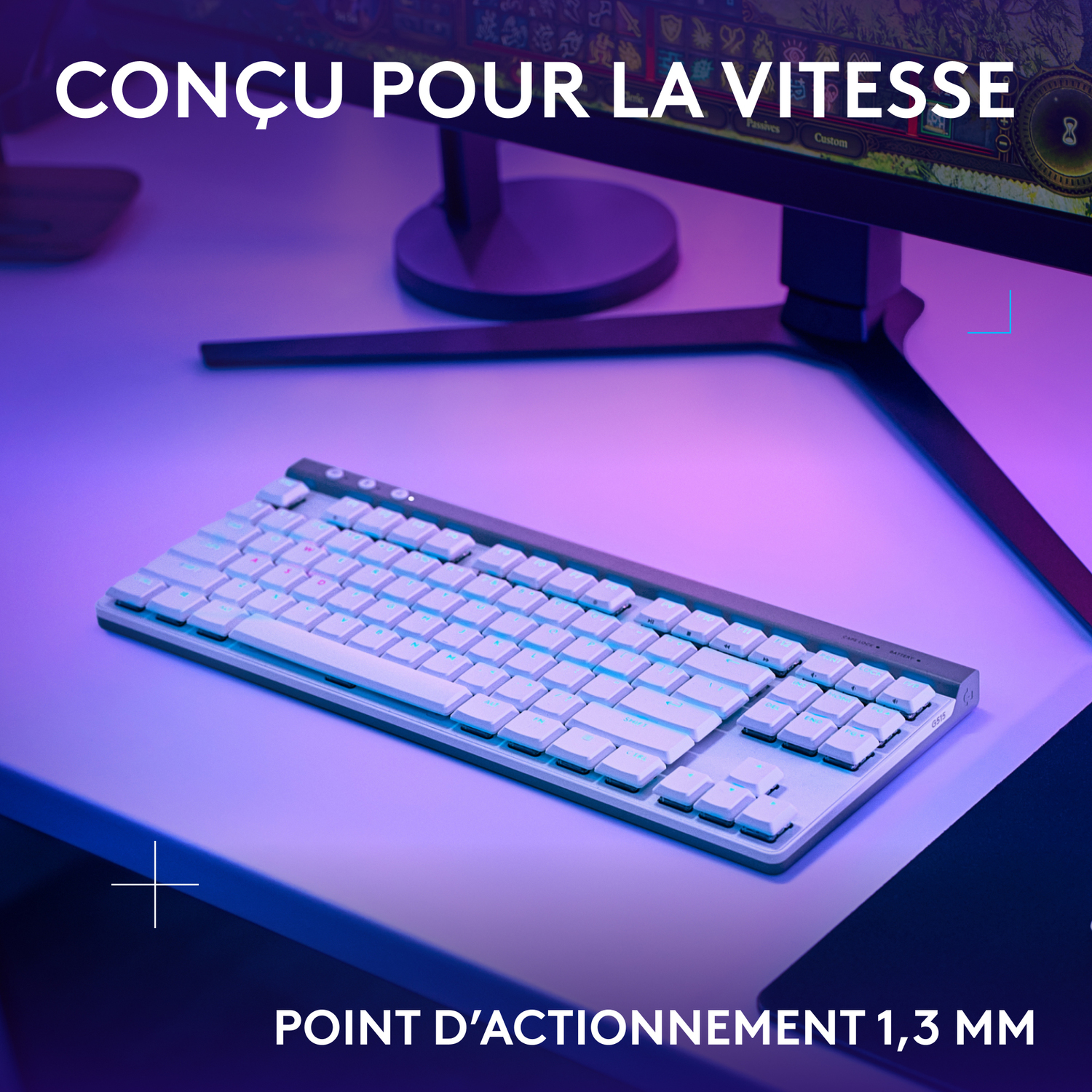 Clavier blanc avec touches rétroéclairées bleues et roses, texte : Conçu pour la vitesse et Point d'actionnement 1,3 mm.