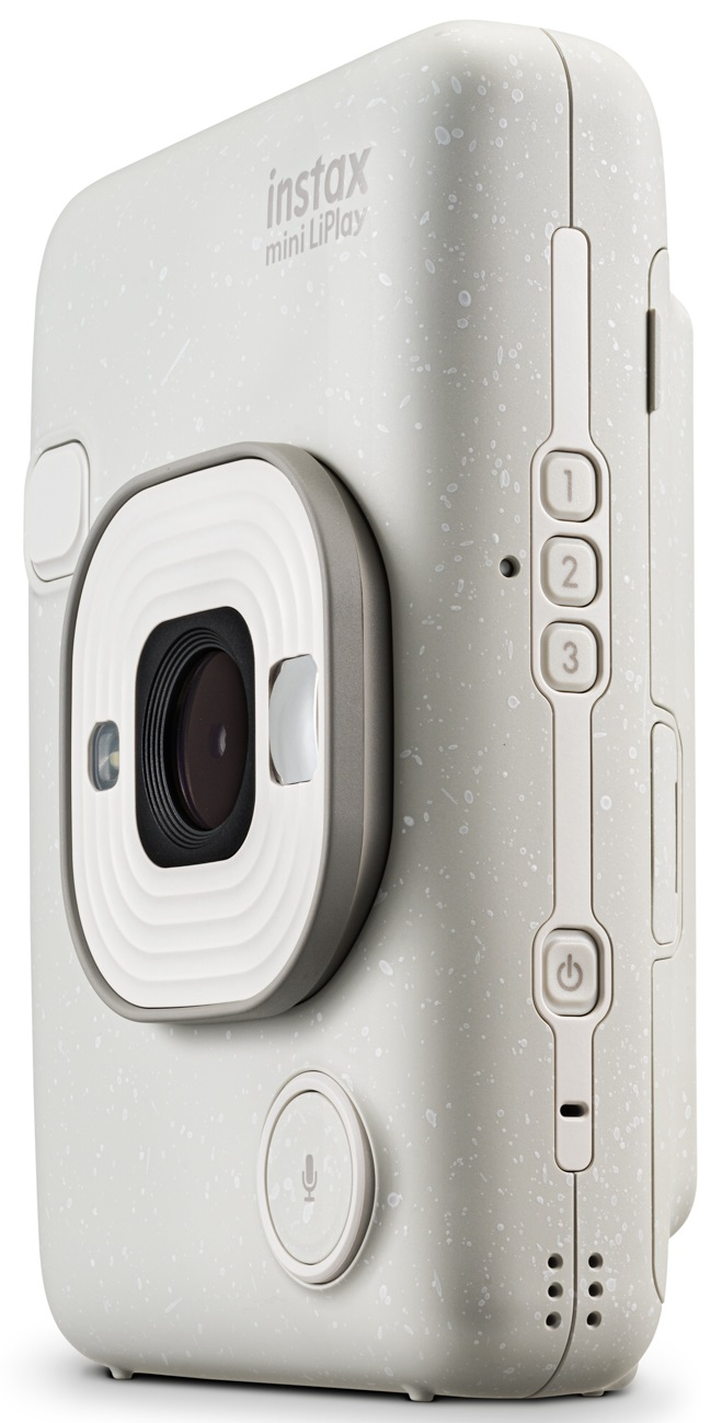 Kremowy aparat Instax Mini LiPlay, widok z boku. Przyciski i obiektyw na teksturowanej powierzchni.