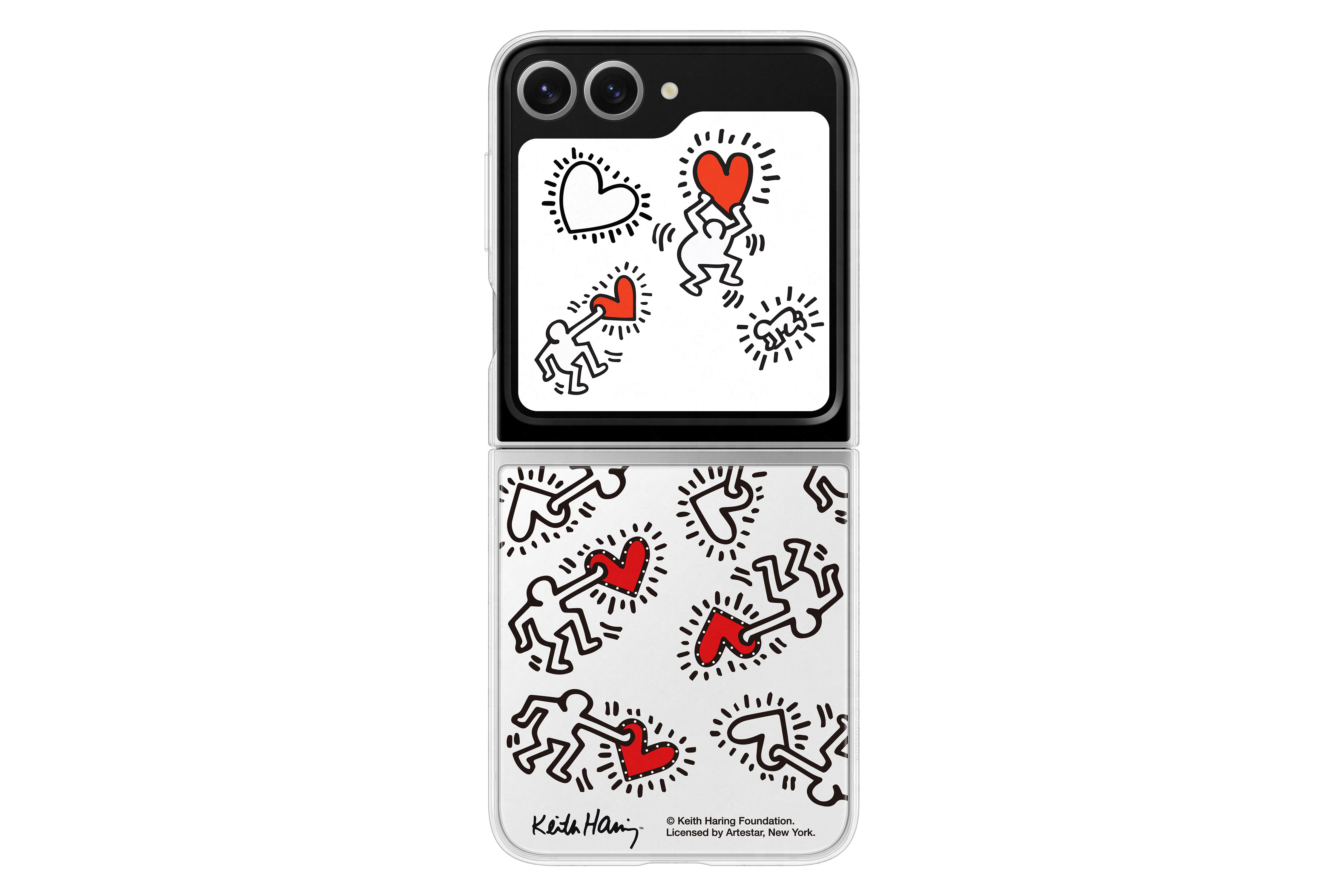Weißes und schwarzes Telefon mit Keith Haring Kunst auf dem Cover.