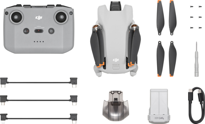 Drohnen-Kit mit Fernbedienung, Drohne, Propellern, Schrauben, Schraubendreher, Kabel.
